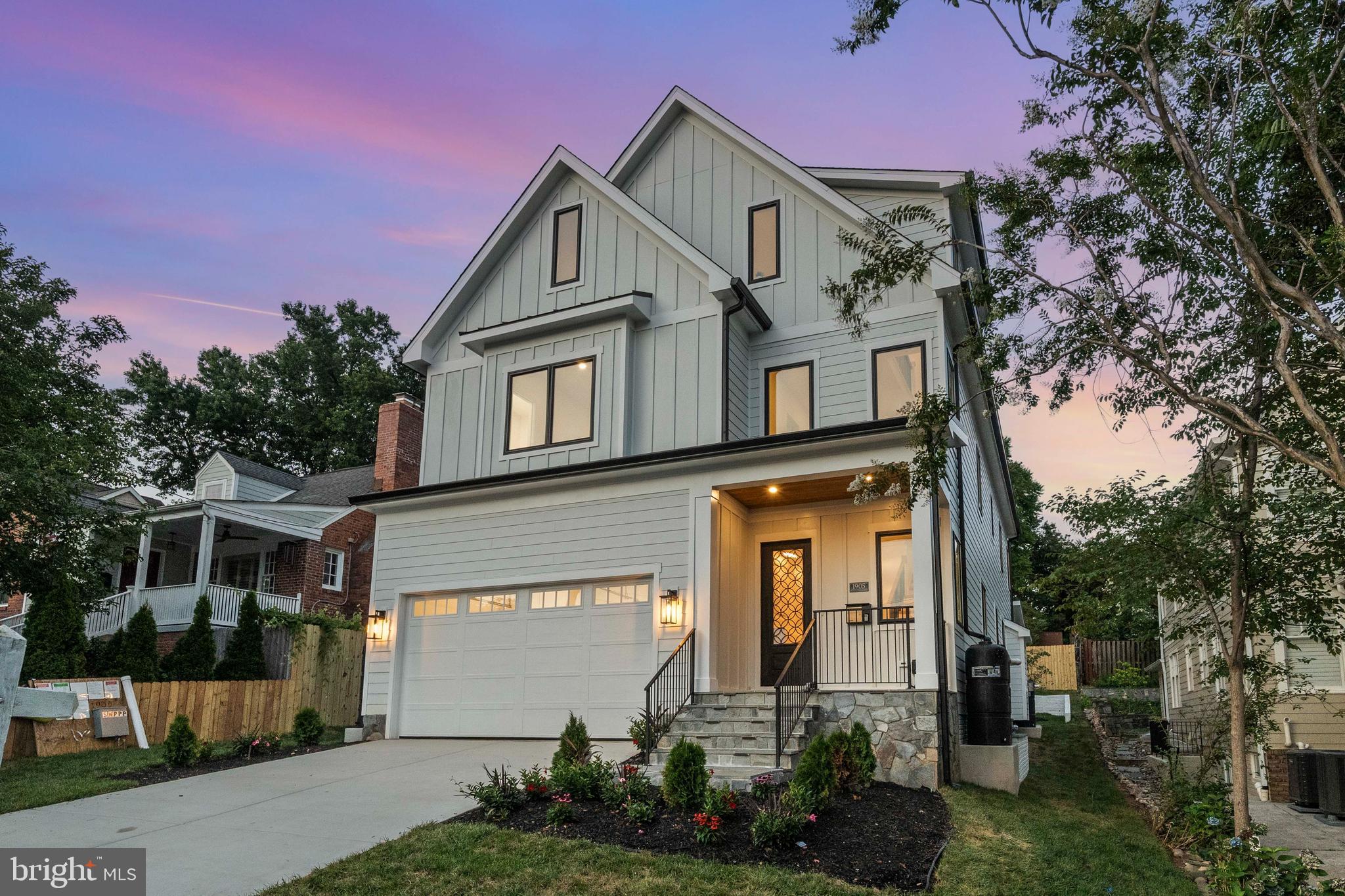 Welcome to 1905 N Taylor Street – A Vision of Modern Elegant Farm House in the Heart of Arlington.
This breathtaking new construction masterpiece offers approximately 6,397 sq ft of thoughtfully curated living space, designed to elevate your lifestyle. With 7 spacious bedrooms, 7 full bathrooms, and a powder room, there’s room for every chapter of your story.
Step inside and be greeted by soaring 10-foot ceilings on the main level, creating a sense of volume and openness that immediately feels like home. The warm, wide-plank NuCore LVP flooring flows seamlessly through the open-concept main level, drawing you into the heart of the home — the family room with a gas fireplace, perfectly positioned for cozy evenings and joyful gatherings.
The chef’s kitchen is a dream come true, anchored by a stunning custom island wrapped in 2½-inch mitered Calacatta Barak quartz, accented by a 6-burner gas range, stainless steel appliances, and an impressive 60-inch Blomberg built-in refrigerator. Entertain with ease or enjoy quiet breakfasts in this sun-filled, functional space. A walk-in pantry keeps essentials close yet discreet.
Host elegant dinners in the formal dining room, or step out to the covered porch, where a gas fireplace, ceiling fan, built-in TV connection, and wired speakers create an outdoor living room you’ll never want to leave.
The main level also features a flexible bedroom or home office, complete with a full bathroom — ideal for guests or work-from-home needs. A mudroom with built-in bench keeps daily routines streamlined and organized.
Upstairs, retreat to the luxurious primary suite, where your private oasis awaits. Enjoy dual custom walk-in closets, and unwind in the spa-inspired ensuite featuring a soaking tub, expansive walk-in shower with double shower heads, and a double vanity lit by modern sconces.
Each additional bedroom includes a walk-in closet with built-in shelving, ensuring space and order for all. The second-floor laundry room is designed with function and style — ample cabinetry, folding space, a sink, and storage to make life easier.
The top-floor loft is an unexpected bonus — perfect as a playroom, guest suite, or creative retreat, complete with its own full bathroom. Downstairs, the finished basement impresses with a wine bar and wine cooler, a carpeted bedroom retreat, a flex space perfect for a home gym, and built-in ceiling speakers for immersive sound throughout.
Modern features like dual-zone temperature control, Cat-6 wiring throughout, a dedicated EV charger connection, and custom trimwork in every room ensure this home is not only beautiful, but future-ready.
Stone walk-up steps with custom lighting lead to your front entry — a hint of the elegance that lies within. From the smooth Arctic White HardiPlank siding to every thoughtfully designed detail inside, this is a home built for living well.
1905 N Taylor Street is more than a house. It’s where memories will be made, holidays celebrated, milestones shared, and everyday moments made extraordinary.
Come see where your next chapter begins.