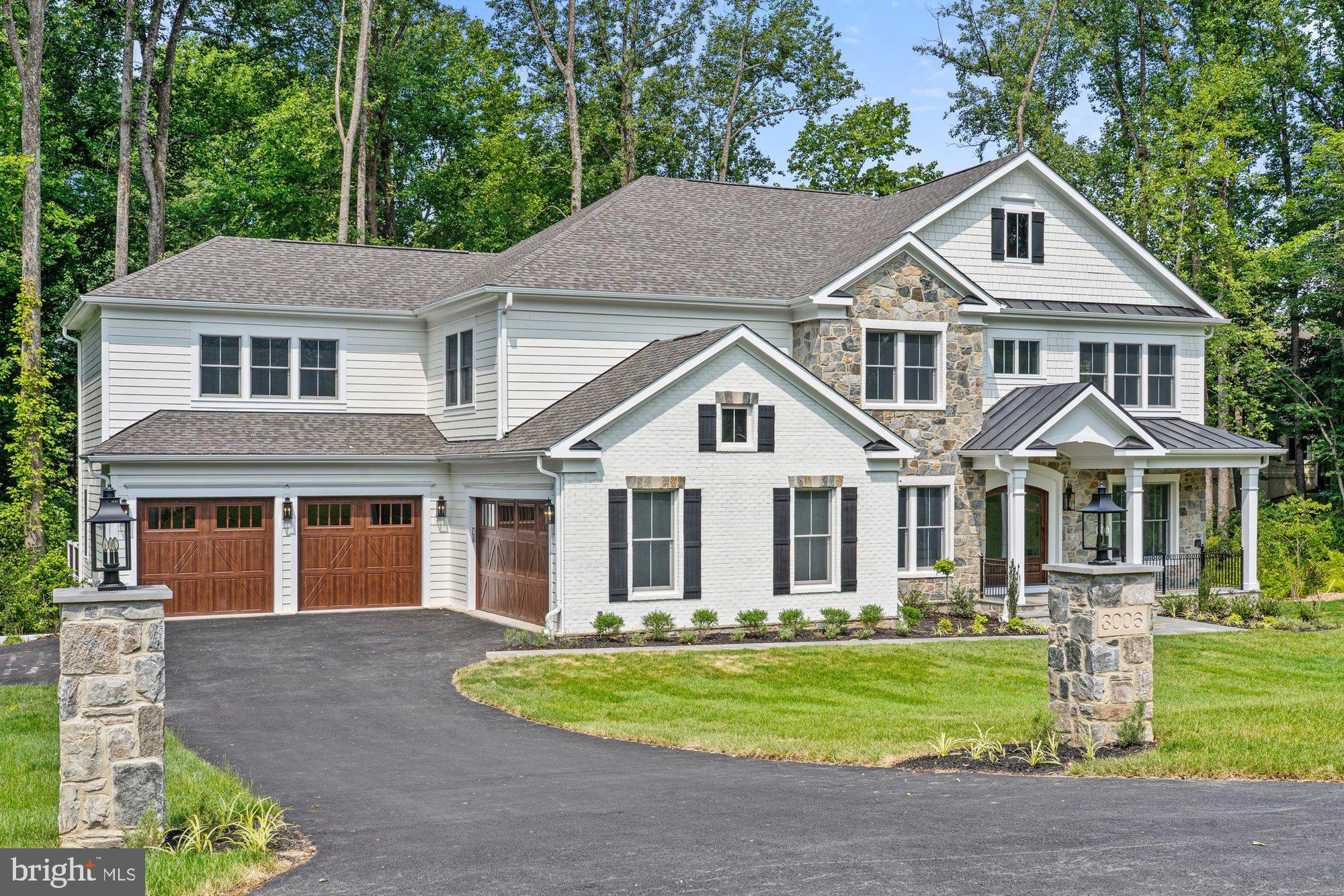 ***Immediate Delivery*** Introducing *The Alexander*, an exciting new home design by Sekas Homes, on a fabulous Oakton homesite with 4 car garage. This modern masterpiece spans 7,307 square feet across three finished levels and is set on an expansive, wooded 1.66 acre lot with a private rear yard perfect for outdoor living and entertaining. This stunning residence includes six spacious bedrooms and 6.5 luxurious baths. The main level boasts a guest suite, ideal for visitors, and the 9-foot ceilings on all levels enhance the sense of openness and light. Whether you’re hosting a formal gathering or a casual get-together, the floor plan offers both private family spaces and open gathering areas to suit any occasion. The gourmet kitchen is a chef’s dream, with custom cabinetry, a walk-in pantry, and ample space for meal preparation. The luxurious primary suite includes an impressive walk-in closet and dressing area, as well as a deluxe bath with a soaking tub, separate shower, and private water closet. The finished lower level is designed for entertainment and relaxation, featuring a recreation and game area, an exercise room, a bedroom, and a full bath. Perfect for all ages, The Alexander offers spaces that are both functional and inviting. Outdoors you will find a screened porch with a Trex deck, offering a seamless connection to nature. Additional features include a 4-car garage (with a 2-car side load and 2-car front load), and an extremely desirable location on Weber Place. Oakton/Thoreau/Oakton Pyramid.