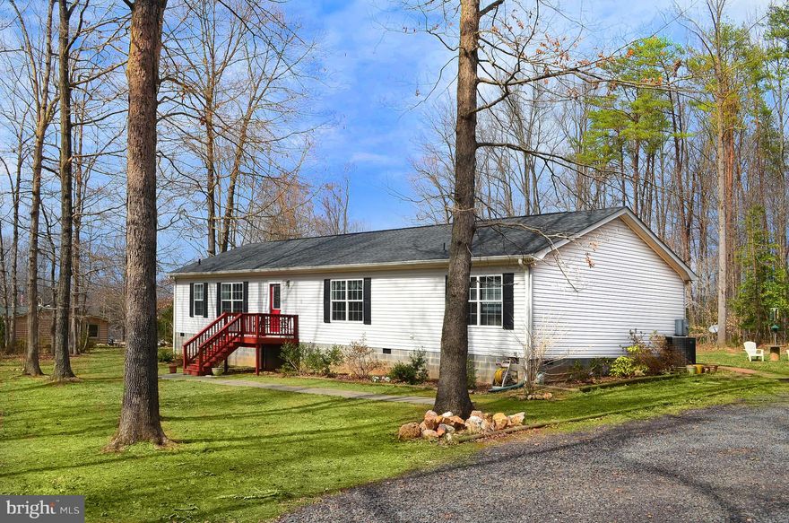 Country living at its best. Excellently maintained   like new, one level, large 4 bedroom rambler on 3 acres. Large master bedroom and bathroom, spacious den, hardwood floors, gas fireplace, expansive sun deck and so much more. Car port, chickens coop, large storage sheds, several fruit trees. Large den can be converted to 4th bedroom Easy commute to everywhere.