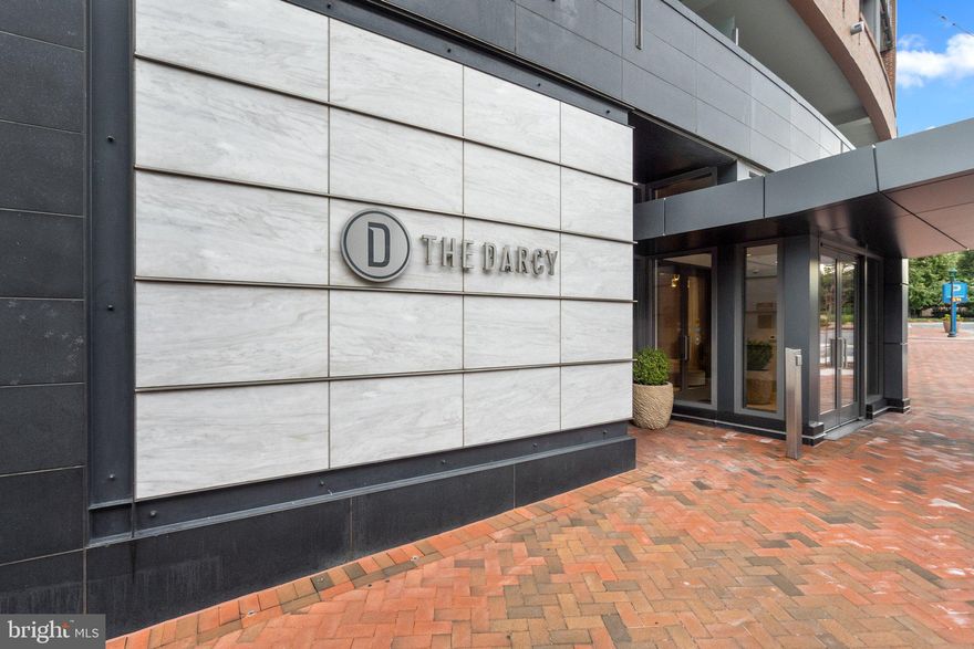 Welcome to the Darcy - an exceptionally well located Bethesda condo building!  This nearly 1,100 sf 2 bedroom/2 bathroom unit has an open floor plan with floor to ceiling windows and hardwoodfloors.  The open kitchen features Bosch appliances, gas cooktop, microwave, & wall oven.  Other features include in-unit laundry, custom closets, recessed lighting, and 1 garage parking space.  The building provides 24/7 concierge service, on-site management, club room, fitness room, and guest suites.  Within walking distance are Bethesda's best shops and restaurants and easy access to the Capital Crescent Trail.
