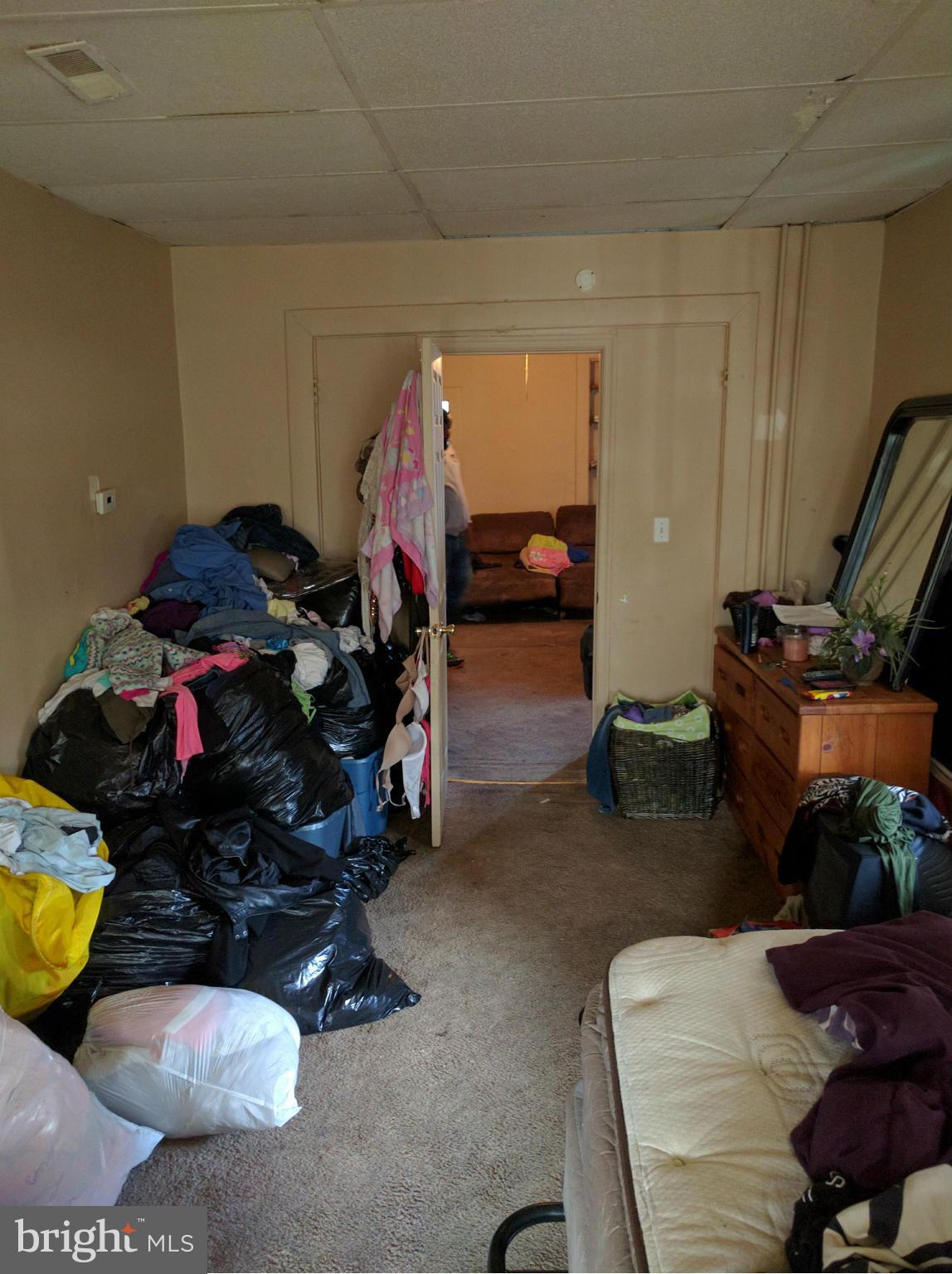 This is access for 2nd floor Apt only. The 1st floor is currently occupied and showings for that unit are by appointment only. The access to the 1st floor Apt is from the side of the property.