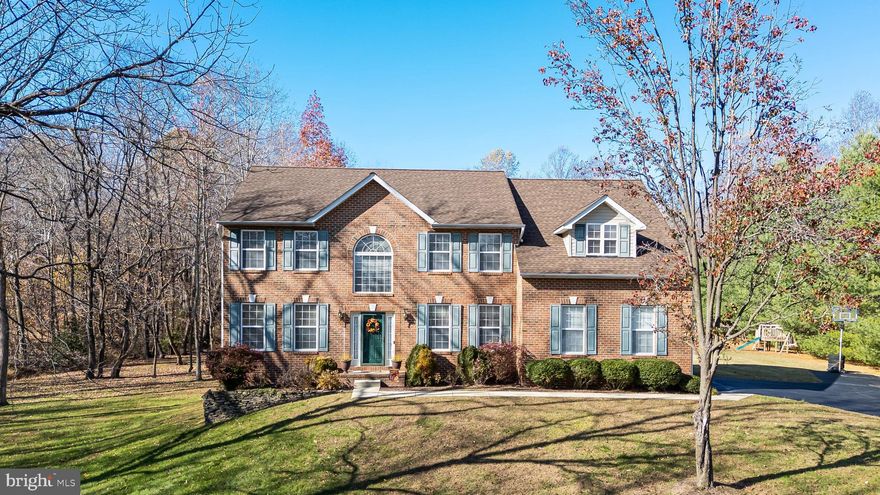 Beautiful Brick-Front Colonial with Room for Everyone!
This 5-bedroom, 2.5-bath home offers a warm and welcoming layout with plenty of space to spread out. The main level includes a private office, formal living and dining rooms, and a comfortable family room with a gas fireplace. The eat-in kitchen opens to a screened-in porch and large deck overlooking a flat backyard — perfect for entertaining or relaxing evenings by the fire pit. Upstairs, the spacious primary suite features two walk-in closets and a large bathroom with dual sinks, a soaking tub, and a walk-in shower. Four additional bedrooms, a full hallway bath, and a convenient laundry room complete the upper level. The full unfinished basement offers endless possibilities and includes a rough-in for a future bathroom. With great curb appeal and a two-car garage, this lovely home has it all. Schedule your showing today!