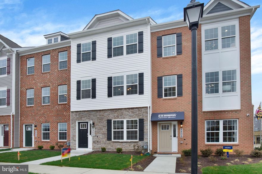 This town home located near green space is situated near privacy. This Columbus townhome offers1,962 square-foot, with 3 bedrooms, 2.5 bathroom, an 18x6 DECK INCLUDED and 2 car rear loading garage. This home is spacious and features an open living concept. The main level features a middle island kitchen with Stainless Steel Whirlpool kitchen appliances with 5-burner gas range, upgraded Gray Cabinets and quartz counter tops. Hard surface flooring on whole main level. The third level has a gorgeous primary bed with a large walk-in closet and features a luxury owners shower with Quartz counter tops. Two secondary bedrooms, upper level laundry hook up, and hall bathroom with Quartz counter tops. There is plenty of space for entertaining family and friends in your finished lower level rec room. This home is also equipped with smart home technology. The package includes a keyless entry, Skybell (video doorbell), programmable thermostat to adjust your temperature from your smartphone and much more. Commuting and traveling is made easy with quick access to 1-495, Route 5 and to the Washington DC area.