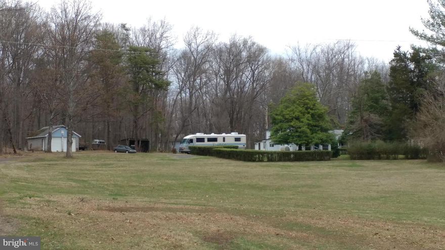 3.9 Acres located in a very picturesque area of Aldie.  What a beautiful site to build your dream home or rehab  and expand the current house.  The dwelling is being sold as is.