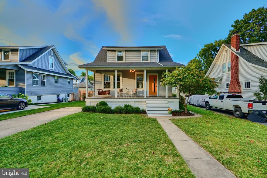 Welcome home to this perfectly updated modern masterpiece in the heart of everyone's favorite Anneslie community! No detail has been overlooked in bringing this class home to the new century, as well as a huge increase in living space. The large porch welcomes you, ready for sitting outside for morning coffee. Hop inside and find a wide open floor plan with incredible hardwood floors leading from the living room out to the kitchen, which has been magnificently updated to become the social heart of the home. Your chef will love the open space and room to work, and you'll spend hours here with friends. There's even a full primary bedroom on this floor with en suite. Head upstairs and the upper level has been raised and expanded to feature a delightful second primary bedroom with large walk-in closet and primary bath. You won't find things like this too much in the area. Two other well-sized bedrooms and an updated hall bath complete the upper level living space. Pop to the basement and that's ready for anything - living space, watching the big game, you name it! Great storage space down here as well. When you head outside, you're greeted with an updated multi-level deck, ideal for summer cookouts or just a glass of wine in the evening. A huge flat yard provides plenty of room for play or activities. Most of the major systems have been updated in the last few years, so all you need to do it move in and enjoy everything this wonderful area has to offer. It's a good life!