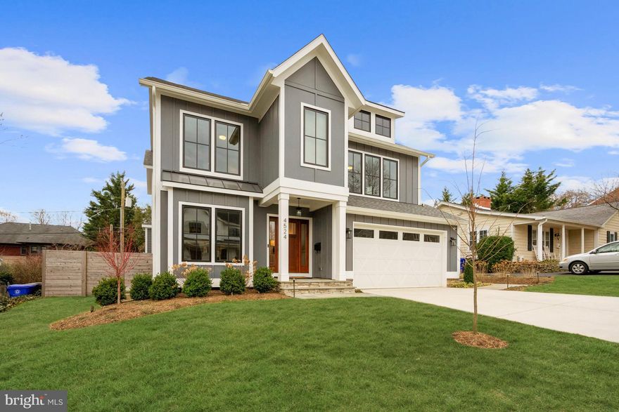 Located in sought after Waverly Hills on an expansive 7400+ sq ft lot, this stunning home was built in 2020 by Classic Cottages and also features a multitude of more recent upgrades.  Whether working from home, entertaining friends, or enjoying your own personal zen retreat, The Savannah spans almost 5000 finished square feet on 3 levels that features an attached two car garage, five bedrooms and four and a half bathrooms.  

The main level is flooded with natural light and gleaming hardwood floors.  For a culinary experience that’s hard to beat, the gourmet, eat-in kitchen includes quartz countertops, Thermador/Samsung appliances, custom cabinetry with incredible storage and functionality as well as an oversized island that serves a perfect gathering place for guests or enjoying quick meals on the fly.  The kitchen flows directly into a large family room with custom millwork and direct access to an outdoor deck that overlooks the fully landscaped back yard and flagstone patio.  Stroll through the conveniently located butler’s pantry to access a formal dining room that is beautifully appointed and can accommodate large dinner parties for entertaining.  For those working from home, there is a beautifully sunlit office with custom built-in shelving.  With easy access from the front load, 2 car garage, the highly functional mud room serves as a great place for informally storing coats, shoes, and anything else dragged in from the great outdoors.

The upper level includes 4 nicely sized bedrooms and 3 full bathrooms.  The owner’s retreat is beautifully appointed with fully customized walk-in closets and a spa like en-suite bath with heated floors.  The 3 other upper-level bedrooms include either a direct access or Jack and Jill style bath access.  The upper level also features a large laundry room with side-by-side washer and dryer.  

The walk up, lower level offers flexibility and fun.  Located adjacent to the large rec room, there is a fifth bedroom, full bath, and separate home gym/office/media room/flex space.   For ultimate entertaining, there is custom built bar perfect or mixing gameday drinks or blending post work out smoothies.  

Other fantastic features include built-in speakers throughout, motorized shades on main and upper levels, hard external gas line for grill/firepit, garage wall hanging system and security system with cameras.

Waverly Hills is conveniently located about one mile from the Ballston Metro and just over 5 minutes to Washington with easy access to the W&OD Trail.  Other fantastic neighborhood amenities include the popular Woodstock Park and the Lee Heights Shopping Center.  This shopping center includes some of Arlington’s finest retailers – Pastries By Randolph, Old Dominion Pizza, Arrowine & Cheese, Barstons Child’s Play Toy Store, Starbucks and the new, very popular Café Colline.