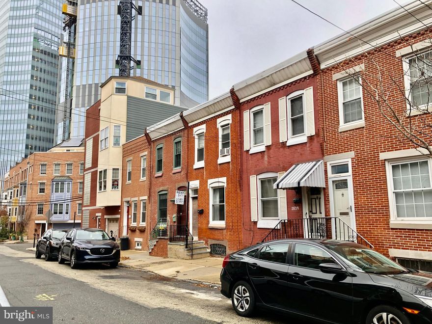 This classic 3BR, 1026 sf 2-story townhouse has great bones PLUS location advantages that just can’t be beat.  First off, it’s in the catchment area for the excellent Greenfield K-8 public school – or if private school is your choice, The Philadelphia School is just 4 blocks away.  Next, its edge-of-Fitler-Square/ Graduate Hospital location is the closest residential area to the Children's Hospital Roberts Center, and it's just across the South St. Bridge from the campus of the University of Pennsylvania, Children's Hospital (CHOP), the Hospital of the University of Pennsylvania (HUP) and Drexel University.

And there’s an amazing parking feature specific to this particular, off-the-beaten-track block.  It’s a limited access, one-way street with houses on only one side of the street, but parking on both sides, so it’s not unusual for residents to be able to park right in front of their own houses.

In the same family since 1959, 2639 Bainbridge has retained its original wood floors and classic layout:  entry vestibule, large living room, full dining room, rear kitchen and private back yard.  Upstairs are 3 bedrooms and a to-die-for classic c.1940s peach & mint green tiled bath. The unfinished basement is tall and clear with possibilities for additional uses.  Everything works as-is, but the next owner will likely want to renovate to make this sweet spot their own.