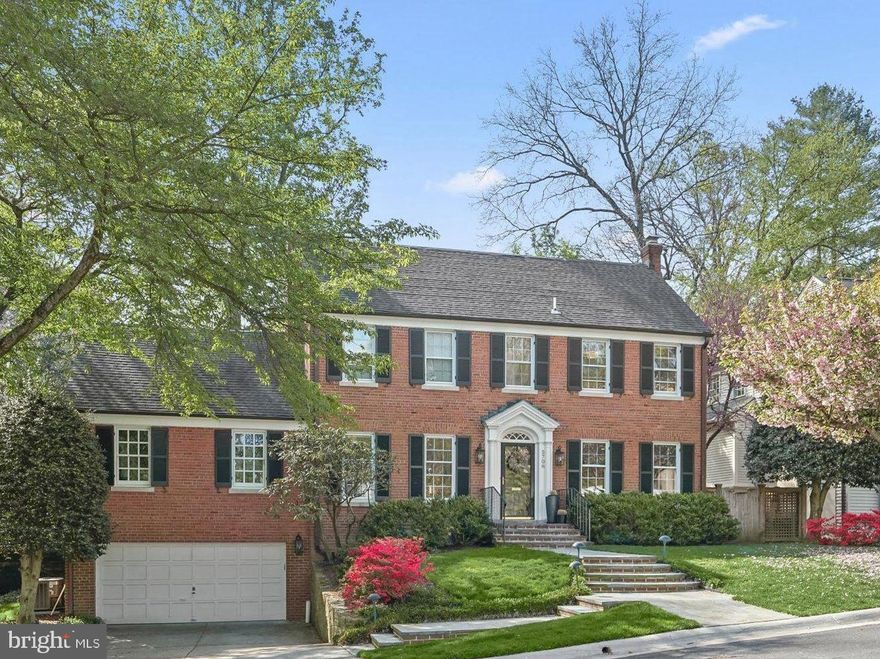 Timeless elegance defines this exquisite brick Colonial, ideally positioned in the coveted Sumner neighborhood of Bethesda. Showcasing exceptional care throughout, this residence offers refined living known for its charm, connectivity, and proximity to the Capital Crescent Trail, parks, and local shopping.

The home features beautifully updated bathrooms, including an indulgent primary suite with his & her spa-inspired baths and custom closets. With four additional full baths and a powder room, the layout provides excellent flexibility for both guests and everyday living.

Designed for grand entertaining and comfortable daily life, the expansive main level includes a generous family room with effortless indoor-outdoor flow. The kitchen and family room open to a private, landscaped backyard retreat complete with a flagstone patio and a peaceful koi pond with a cascading waterfall.

The upper levels offer spacious accommodations, including a finished attic with a full bath—ideal for a private office, guest quarters, or an additional bedroom suite. Additional enhancements include refinished hardwood flooring, curated lighting, gas fireplaces, abundant storage, and a two-car garage. A repointed flagstone walkway further enhances the home’s striking curb appeal.

This is a rare offering in one of Bethesda’s most desirable enclaves, seamlessly blending classic architecture with elevated, turnkey living.