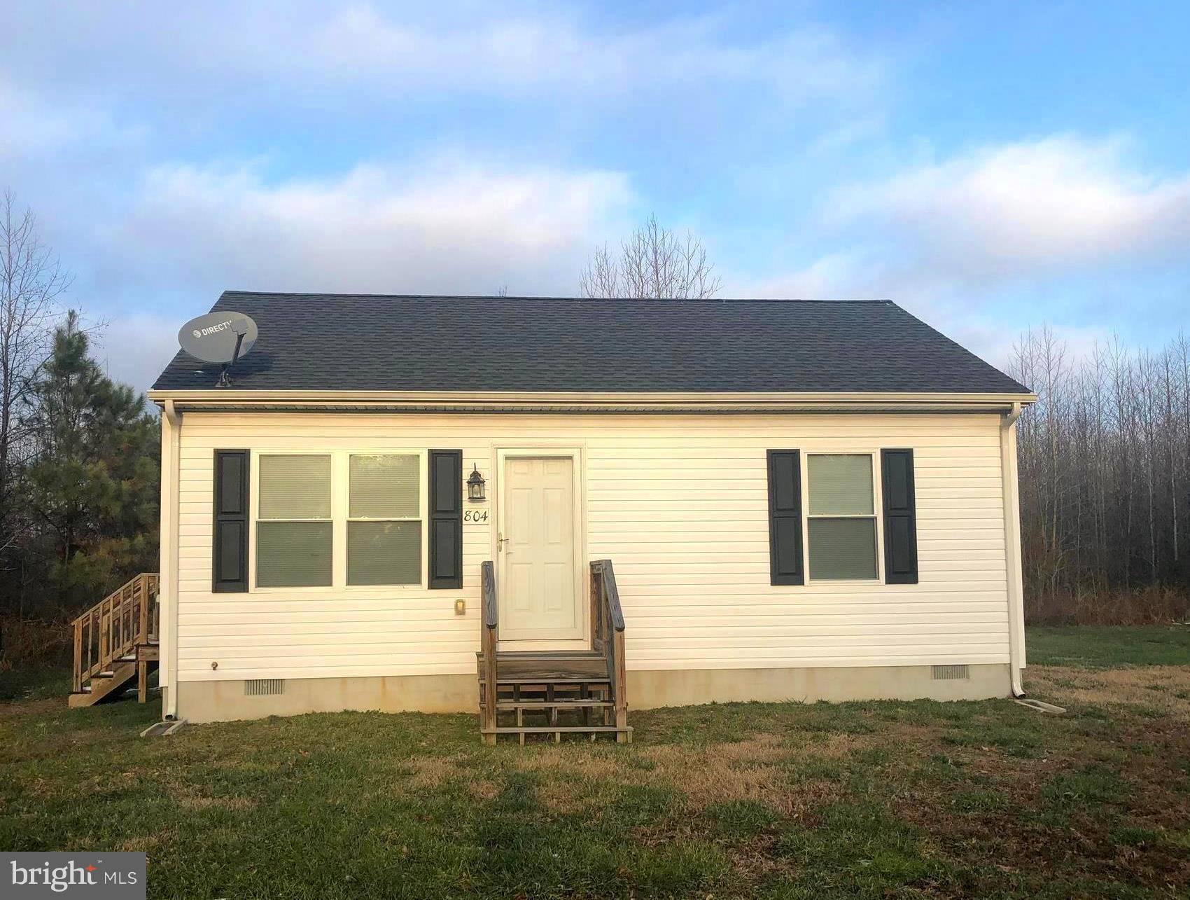 Newly Built in 2015 and Cute as a Button! Surrounded by Trees, Privacy and Nature abound! This Home offers 2 Bedrooms and 1 Full Bathroom with an open Family Room and Kitchen space. All new Appliances too! Private driveway with ample parking! Just minutes from downtown Centreville. Your chance to get this Single Family Home for Less than a Condo price!!