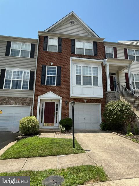 This spacious townhome is a Tenant's dream-come-true and it's available for immediate move-in! Offering three fully-finished levels, four bedrooms, and three full and one half bathroom in 2,542 finished square feet there is plenty of room to spread out and relax! The primary bedroom and bathroom are located on the top level of the townhome which also offers two additional bedrooms and another full bath. Level two holds a half-bath, the kitchen and dining area, and the living room complete with a window-seat with built-in storage! The entry level presents bedroom 4 and another full bath as well as the laundry area and a one-car garage! The bedroom and full bath on the entry level means a second and easily accessible en suite for guests or for family members! No need for a fourth bedroom? This room can also be used as a spacious family room! Sliding doors on the entry level and a French door on the main level provide access to the backyard with a ground level deck and to the middle-level deck. Perfect for entertaining, grilling or just relaxing. Applications will be submitted online via Rent-Spree.