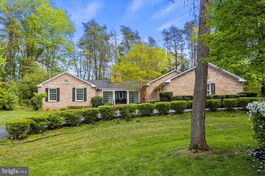 Enjoy expansive main-level living on 5 acres in this all-brick beauty, lovingly maintained by its original owner. A private oasis on a quiet street with over $20,000 in recent upgrades (2023 - Fresh paint & new carpet, new well pump, 2022 - Septic pumped & parts replaced, 2020 - HVAC replaced, 2008 - Primary bath and kitchen renovated). *PRICED $30K BELOW APPRAISED VALUE* Robinson HS pyramid. Close to everything! – Historic Clifton, Paradise Springs Winery, Burke Lake Park, and more. Ready for the next owner to fill with love and memories.