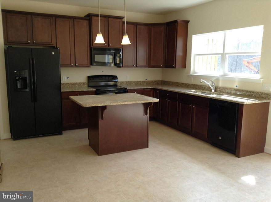 Immediate delivery! Very spacious town home with open floor plan. Gourmet kitchen with beautiful white cabinets &Granite counter tops. Stunning dark hard wood floor in the living room. Cathedral ceiling in Master. Finished Rec Room! Breathtaking view from leveled backyard. Great location! Beautiful Neighborhood! 0 DOWN PAYMENT and $12,000 CLOSING HELP! Pictures are For Demo Purposes Only.