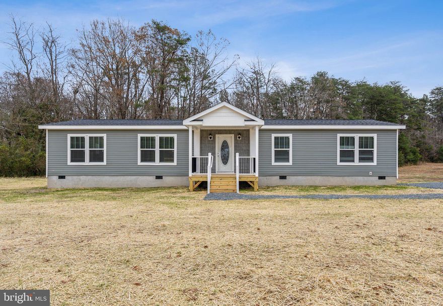 **Huge Price Improvement** Welcome to 11135 Quail Ave in beautiful King George, VA!  This new construction 3 bedroom, 2 bathroom home sits on over 2 acres and is ready for you to move in right away.  Beautiful kitchen with a large island and stainless steel appliances, eat-in kitchen area, large family room, spacious primary suite with a spa-like bathroom and large walk in-closet, 2 well-appointed additional bedrooms on the opposite side of the home, built-ins/utility sink in the laundry area, as well as large driveway space with separate side door entrance, huge back deck with tree views, and last but certainly not least, a wonderful cover front porch.  This house has everything you will need and then some.  Be sure to check out the virtual tour for this home as well.  Don't delay!
