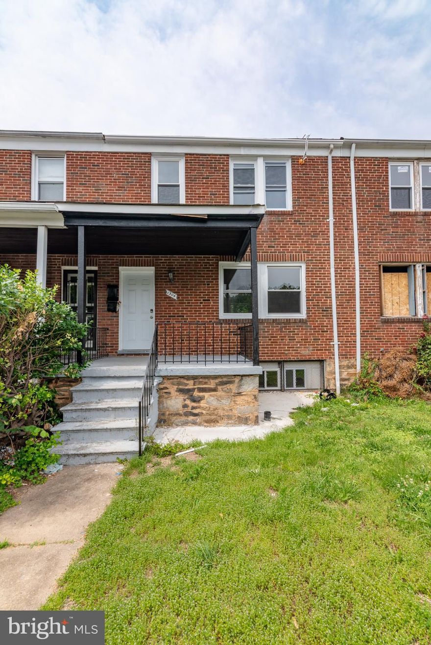 List price to be opening bid at online only auction.  Online auction to be conducted on Auctioneers website. Bidding begins Thursday, July 3rd & ends Tuesday, July 8, 2025 at 12:00PM. This updated brick townhouse is configured as two separate residential units and includes a covered front porch, offering flexible living or rental potential. The property is not occupied and is move-in rent ready. 

Unit 1 (Main & Lower Level):
• Main level includes living area & 2 bedrooms, all with laminate wood style flooring 
• Lower level includes kitchen, dining area & full bath
• Walk-up from lower level to the backyard
• A/C compressor in the backyard
• Forced hot air heating system in lower level

Unit 2 (Upper Level):
• Living Areas: Two bedrooms with laminate flooring
• Kitchen: Laminate wood style flooring
• Bathroom: Full bathroom
• Mini-split A/C unit

Additional Features:
• Separate electric meters for each unit
• Sump pump in lower level
• Separate electric meters & gas meters for each unit
• Potential off street parking on backyard concrete pad

This property in the Berea neighborhood presents a practical investment opportunity or a versatile living arrangement with updated finishes and essential mechanical systems in place. “Berea is situated in East Baltimore, bordered by Sinclair Lane to the south, Milton Avenue to the east, Edison Highway to the west, and Biddle Street to the north. It lies between Broadway East and Orangeville neighborhoods, offering convenient access to major commuter routes.” (Per Wikipedia)