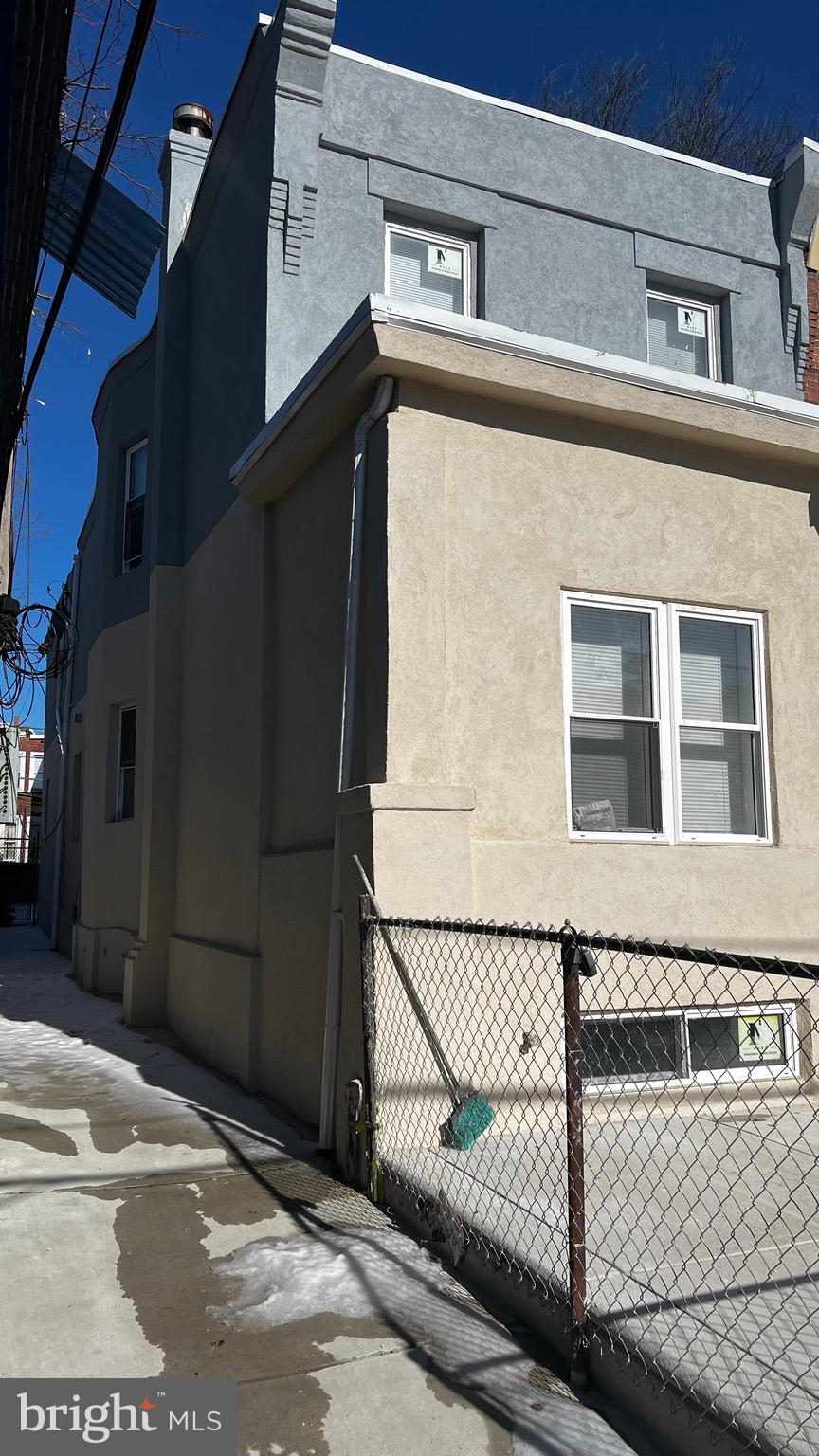 A completely renovated end of row offering in Cobbs Creek neighborhood. This house features 3 nice sized bedrooms on the second floor and one bedroom on the first floor. 3 full bathrooms. Fully finished basement