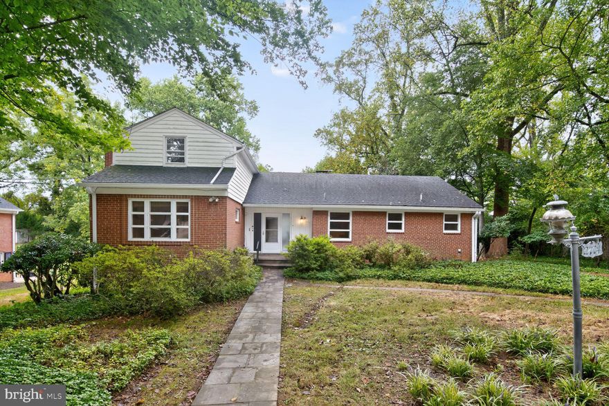 Tremendous opportunity in Chevy Chase!  Large, 6-bedroom brick colonial with great bones on a huge 22,450 square foot lot in Rock Creek Forest that conveys with an additional, contiguous 5,500 sqaure foot outlot.  Main level features a gracious foyer, large table-space kitchen, living room with wood burning fireplace, den with vaulted ceilings, glassed-in porch, primary bedroom with ensuite bath, second bedroom, and second bath.   The upper level has three more bedrooms and a shared bath, and the lower level includes a large recreation room with a second wood burning fireplace, sixth bedroom, fourth bath, and two big storage rooms.  With nearly 5,000 square feet of interior space, this property could be renovated into a spectacular home or replaced with a fabulous new build.  Conveys as-is.  Conveniently located close to Rock Creek Forest Elementary School, Rock Creek Shopping Center, Meadowbrook Horse Stables and Community Park, Candy Cane City, Rock Creek Park, Rock Creek Pool, Metro, and the Beltway, this unique property is a short drive to  Silver Spring and Bethesda with easy access to downtown Washington DC.