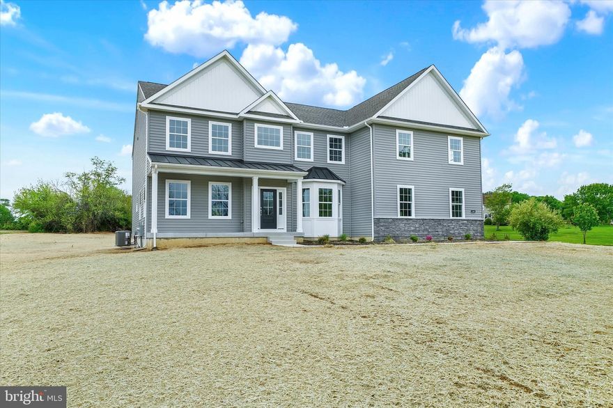 FINAL OPPORTUNITY to own in this exclusive 5 Custom Home Subdivision!  Brand new Estate Home available NOW set on the last remaining 3 acre parcel with NO HOA Restrictions!  This stunning home built by established Local Builder offers over 4500 impressive square feet of beautifully designed living space.  Minutes from Route 1 and Middletown conveniences in a unique and rare rural setting yet close to everything your life may need.  Low Property Taxes and Tax-Free Shopping in Delaware are another bonus in addition to being close to the Delaware Beaches!  The design is impressive, offering a Modern Farm House Inspired Colonial appeal with a traditional layout incorporating modern finishes.  A breathtaking 2-story great room featuring soaring ceilings and a dramatic overlook allows natural light to fill the rooms and joins effortlessly into the kitchen and the sunroom which has views of the private rear acreage.  The heart of the home is a spacious, thoughtfully designed kitchen with a center island with gas cooktop, dramatic vent hood, wall oven and microwave and the must have walk-in pantry, ideal for both everyday living and entertaining.  A formal Dining Room will bring together a crowd or for a simple dining pleasure meant to provide escape from everyday life.  The Living Room becomes your gathering space for conversations after your meal or a comfortable place to enjoy reading, relaxing and recharging.  A spacious office and full bath on the main level adds flexibility for guests or multigenerational living.   A beautiful stairway and dramatic overlook brings you to the Bedrooms where this home continues to impress. The Primary Bedroom is a true retreat, complete with a private sitting room, generous walk-in closet, and a deserving spa-inspired bath. The private Princess Suite with Full Bathroom along with two additional Jack and Jill bedrooms connected by an amazingly generous size bathroom is the ideal bedroom layout for a home of this caliber.  Enjoy the convenience of a second-floor laundry room with large closet & utility sink.  The enormous basement provides incredible potential for your visions: a home theater, fitness room, or additional living, entertainment or recreational areas that can be in your future.  Outside there are endless possibilities on your 3-acres of open, useable land to bring to life your resort style amenities vision.  Or if it is a detached garage or workshop in your future, or desire to have chickens or horses, you can do that too!  This is more than a beautiful home, it’s an opportunity to own an exclusive and private estate-style property without compromise.  Do as you please and no worries about the typical subdivision rules and restrictions. You make the choice as to how to live and fully enjoy this gorgeous new construction home and all the surrounding land that will be yours.  Call your Agent today for your private tour! NOTE:  All room sizes, acreage and square footages listed are estimates and to be verified by Buyer.  Professional Photos have been enhanced with editing.