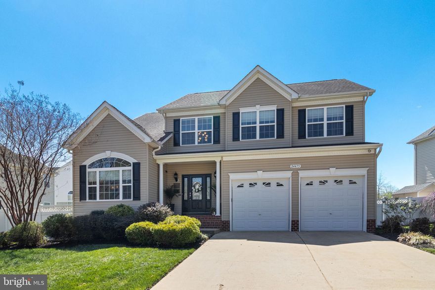 Welcome to this immaculate Ashford model in the highly desirable Broad Creek community, offering over 4,300 square feet of beautifully finished living space designed for comfort, style, and functionality.

Step inside to a grand two-story foyer highlighted by hardwood flooring and recessed lighting throughout the main level, creating a bright and welcoming first impression. The home features five spacious bedrooms and three and a half bathrooms, providing plenty of room for family and guests.

At the heart of the home is a gourmet kitchen complete with granite countertops, a large center island, upgraded tile backsplash, and double wall ovens—perfect for entertaining or everyday living. The kitchen flows effortlessly into the living areas while still offering elegant, defined spaces, including a formal dining room accented with crown and chair rail molding and a formal living room with soaring 10-foot ceilings.

Upstairs, convenience meets comfort with a bedroom-level walk-in laundry room and generously sized bedrooms.

The fully finished basement offers exceptional additional living space, featuring a fifth bedroom and a full bathroom, making it ideal for guests, a home office, or recreation area. It’s the perfect place to relax and enjoy a movie night.

Step outside onto the rear deck overlooking a peaceful common area, providing added privacy and a great space for outdoor entertaining.

Ideally located just minutes from shopping, dining, schools, and Naval Air Station Patuxent River, this home combines space, elegance, and convenience in one exceptional property.