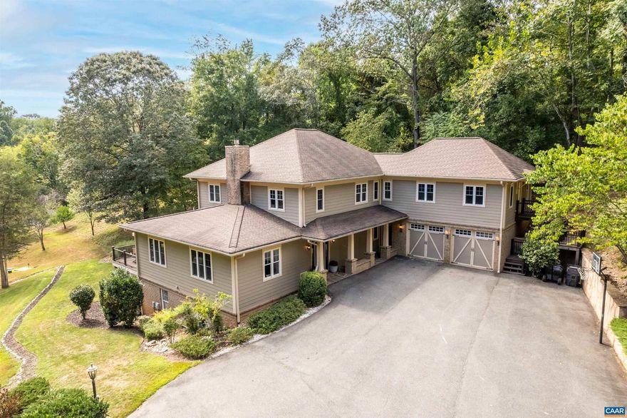 WELCOME HOME to this stunning private oasis nestled on 6 acres in the heart of Ivy! Recently updated, 4+ bedroom home has all you need in the perfect location: featuring a chef's kitchen with one of a kind custom reclaimed woodwork, an open layout that seamlessly connects the kitchen, dining, living room, indoor/outdoor deck and even a one-bedroom, one-bath guest apartment with its own entrance, kitchen, and living space--making it ideal for guests, nannies or in-laws. The property includes a geothermal system, solar-power and a 3-zone heating/cooling system--creating sustainability and luxury at every corner. Additional features: a fully finished walkout basement, salt water pool, walking trails, mature landscaping, pond access, garden beds, fruit trees, and so much more. Don't miss this special retreat with easy access to all-things Charlottesville and Crozet!,Granite Counter,Marble Counter,Wood Cabinets,Wood Counter,Fireplace in Living Room