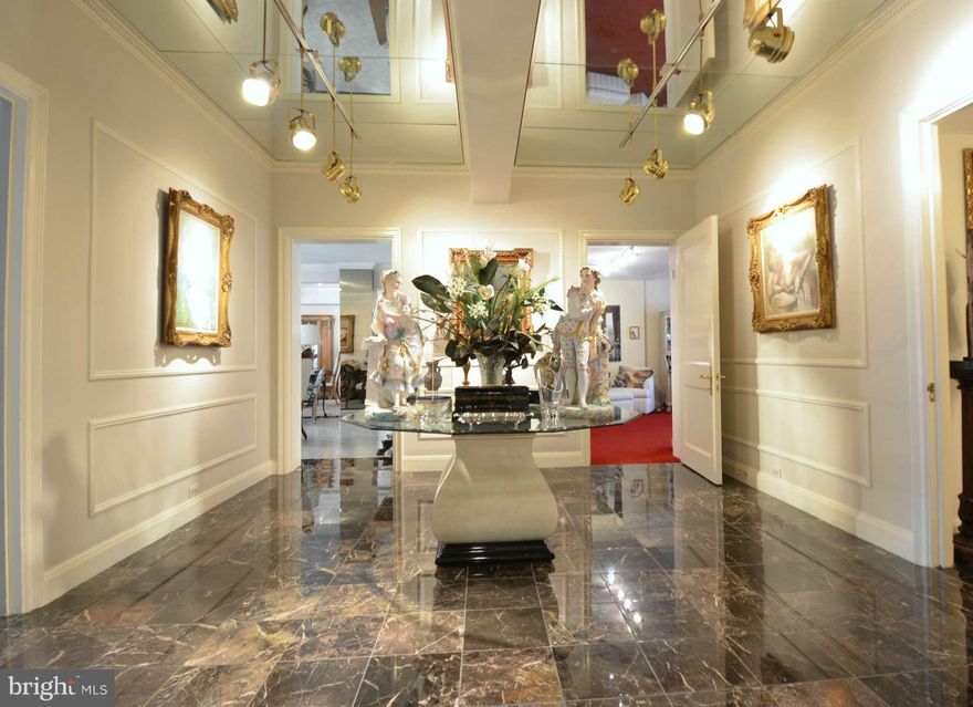 Major Price Adjustment!  Spectacular double unit with over 4,000 square feet of exceptional living.  Decorator touches throughout with tons of built-ins, lavish living/dining room, updated appliances and counter tops and extraordinary lighting. Master bedroom suite with dressing room and double closets, marble bath including sauna & steam shower.  The list is endless.