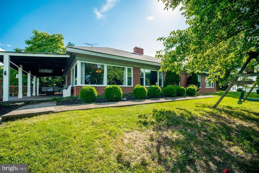 Amazing and unique home in Martinsburg City.  No HOA.  Home has 4 large bedrooms, Living Room, Kitchen, Dining Room and forward Sitting Room.  Amazing and HUGE Covered Porch and Deck above your 3 Car Garage.  Full unfinished basement.  This home is solid as a rock!  Constructed of steel and concrete.  If you are looking for a great home at a great price this is it.  Lovely yard and close to downtown or I81. Easy commuter location.  All bedrooms have transom windows above the doors.  One bedroom has a half bath attached.  Full bath on the main floor.  Bedrooms feature closet systems in each room. Fireplace in Living Room, this home is truly a gem.  Must see to appreciate.