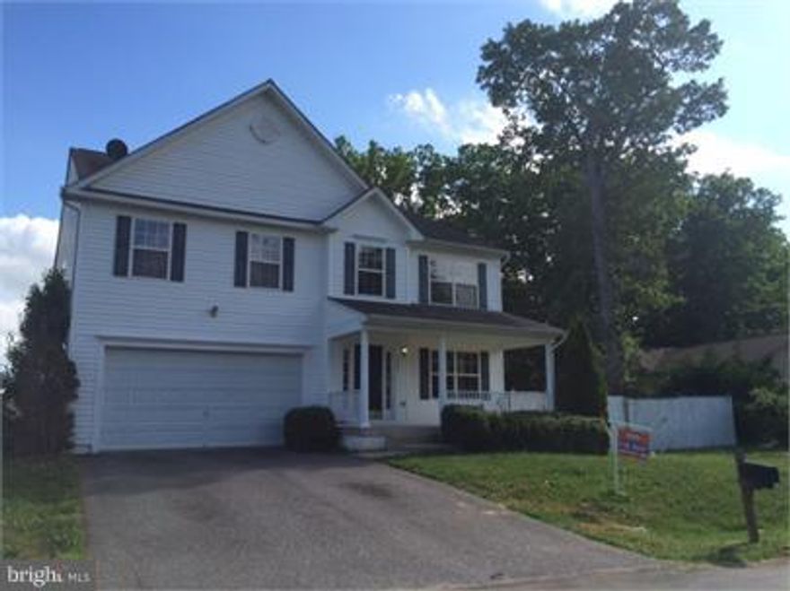 This Colonial has 4 Huge Bedrooms all with Walk In Closets and 2 1/2 Baths Upstairs. Fully Finished Walkout Basement with an additional Kitchen, Living Room, Full Bath and a 5th Bedroom and 2nd Laundry Room...can be used as a In Law Suite!  Home Features a Large Kitchen with Island opening to Family Room, Dining Room, Formal Living Room. 2 Car Garage, Large Fenced in backyard!