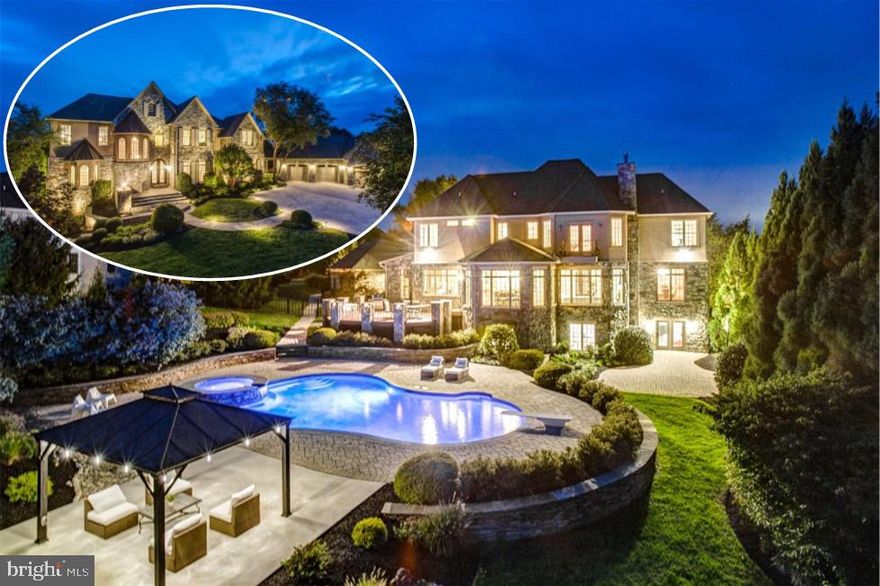 Magnificent, stately stone and stucco masterpiece in sought-after Fox Meadow in West Friendship.   A grand curved stone patio and wrought-iron doorway welcome you into close to 9,000 square feet of luxurious finished living space.  The foyer stuns with natural stone tile flooring, 10 foot ceilings, curved staircase and arched entries into every room.  Main level living continues with architectural details at every turn - triple crown moldings, chair rail, shadow boxing, 8 foot doorways, oversized windows and custom treatments throughout.  Entertain a dinner party in the massive dining room with hardwood flooring and ornate moldings or lounge in the library with views overlooking the landscape.  Step down into the sunken family room with hardwood flooring, gas fireplace with floor-to-ceiling stone hearth and coffered ceiling.  The gourmet kitchen is sure to impress the most discerning chef with Heritage custom cabinetry, Viking stove and ovens, granite countertops, wine fridge, center island with custom butcher-block top, and tiered breakfast bar.  This kitchen is full of surprises - hidden spice racks, warming drawer, pot filler, stylish cabinet fronts conceal the full sized Sub-Zero refrigerator, full-sized Sub-Zero freezer and dishwasher, reverse-osmosis filtration system, and don't miss the built-in vacuum system!  Enjoy breakfast in the octagonal breakfast room with panoramic views of the back yard or cozy up with coffee next to the gas fireplace with stone surround.  Butlers pantry with wine fridge, additional office with built in desk and workstation and plenty of cabinetry.  Two other wings off the main level offer a private nook for reading with half bath, or a mudroom area with laundry room, laundry chute, second powder room, coat closet with custom shelving and access to back staircase.  The soaring ceilings continue to the private level living.  The master suite offers a privacy entrance through hidden pocket doors.  The huge main room boasts hardwood flooring, tray ceiling with up-lighting, access to private balcony and sitting area with gas fireplace.  Two huge walk-in closets and private bath with natural stone flooring, dual shower fixtures, dual vanities, circular, jetted, heated tub with waterfall and separate water closet finish this suite.  Three other generous bedrooms with walk-in closets and two additional full baths complete the upper level.  The lower level features a recreation room that spans the length of the house with stone wall and color-changing fire feature and full bath.  Gym complete with equipment, storage room with tons of shelving, utility room with two water heaters, water filtration system, central vacuum and humidifier.  The in-law suite offers a 5th bedroom with walk-in closet, kitchenette with quartz counter and wet bar, and private full bath with oversized shower, built-in bench seating dual shower heads and separate water closet.  Two walk-outs offer private entrance/exit for in-law suite and main entry from yard.   Outside, the grounds are an entertainers dream.  A stone and composite deck sets the stage, overlooking a stone-paver patio surrounding a heated in-ground pool and jetted hot tub with waterfall.  A pool-side gazebo is the perfect spot to lounge, offering a  fire pit and access to internet and electricity.   Three-car garage with storage space, cabinets and two side entrances offer easy access.  The meticulousness of the professional landscape and hardscape of the exterior, rivals the details found on the interior.  Hidden under the impressive scenery is a drainage system for rain water.   With so many details, you must visit this home to truly appreciate all it has to offer! One year home warranty included!