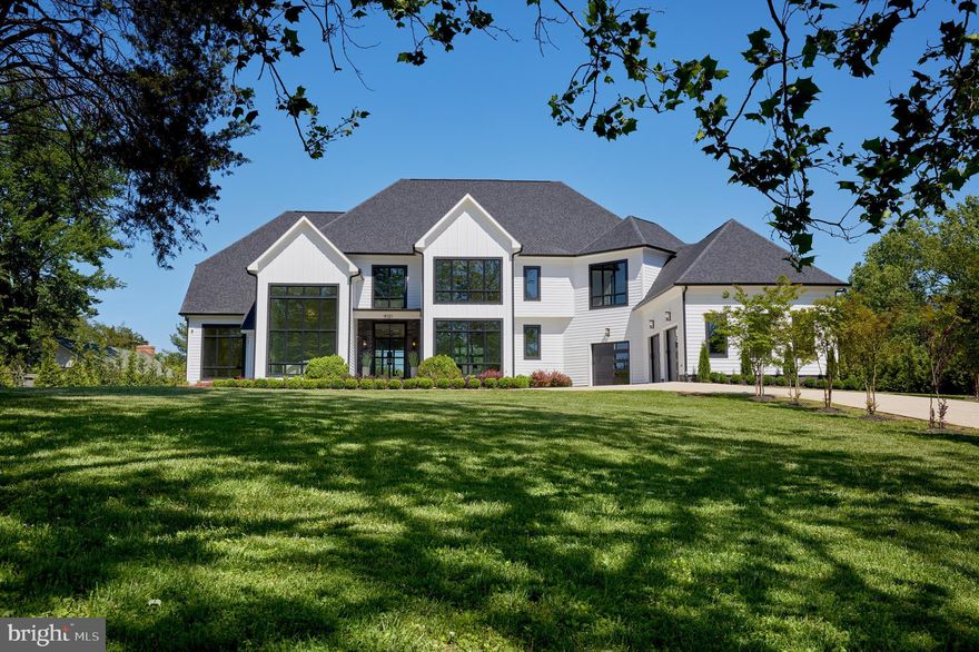 Welcome to your dream oasis, a stunning luxury estate that redefines sophistication and elegance. Nestled in the prestigious enclave of Bradley Farms, this architectural masterpiece offers an unparalleled blend of modern design and eternal sophistication.

As you enter through the grand foyer, you're greeted by soaring ceilings and expansive windows that bathe the home in natural light, offering breathtaking views of your own private sanctuary. Adjacent to the foyer is the dining room and living room. The spacious formal dining area is complemented by custom millwork that enhances the luxurious atmosphere found in many rooms throughout the home.. The elegant living room features a sophisticated tray ceiling and its own gas fireplace, perfect for refined gatherings or quiet relaxation.

The open-concept living spaces are perfect for both entertaining and grand scale living, featuring a state-of-the-art chef’s kitchen with top-of-the-line appliances, equipped with a built-in coffee machine, Combi wall stem oven, and a 6 burner gas range with 2 ovens and grill. A catering kitchen further supports grand scale hosting. The kitchen seamlessly flows into the stunning family room, where a striking two-sided gas fireplace adds warmth and ambiance.

The main floor also boasts a luxurious grand guest suite, providing comfort and privacy for visitors, alongside a secluded office, strategically positioned to offer a quiet and productive workspace.

The master suite is a true sanctuary, featuring a serene sitting room with a dual-sided gas fireplace and boasting a luxurious spa-like bathroom, double walk-in closets, plus a sophisticated tray ceiling that adds an extra touch of elegance. Each additional bedroom is thoughtfully designed with en-suite bathrooms and designer finishes. The enlarged laundry room is conveniently located on the upper bedroom level.

For ultimate convenience, the home is equipped with an ELEVATOR, seamlessly connecting each level of the expansive 13,491 sq ft estate.

The lower level is an entertainer’s dream, featuring a wet bar, a game room, a recreation room, and a convenient walk-out to the expansive 2.46-acre property. Additional amenities on this level include a home theater for cinematic experiences, a wine cellar for the connoisseur, and two guest ensuites/home gym to maintain your fitness routine. This estate is perfect for MULTI-GENERATIONAL LIVING and  RESIDENTIAL STAFF.

Step outside from the main level to the expansive deck, ready for outdoor home entertaining. The landscaped grounds have plenty of room to add a sparkling pool, pool house, sports court, and outdoor kitchen designed to your personal vision.

The estate includes a 3-car garage, a mudroom for practicality, and wide plank hardwood flooring throughout, complemented by exquisite designer lighting. A smart home system offers ultimate convenience and security.

Situated close to Potomac Village, Congressional Country Club, Bethesda, and I-495, with easy access to DC and Virginia, this property offers the perfect balance of privacy and accessibility.

Experience the pinnacle of luxury living in this exquisite estate. Schedule your private tour today and discover the unmatched lifestyle that awaits you.