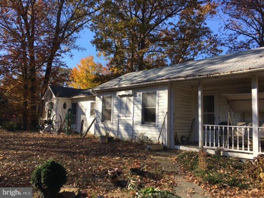 Great location & potential! Unique opportunity to own a prime 1+ acre property with old growth trees and long private driveway in southern Stafford. Tucked out-of-the-way yet conveniently located to VRE, public schools, and downtown Fredericksburg. Increase the value of your investment by re-imagining this "AS IS" older home, or build the home of your dreams on this charming, secluded property.