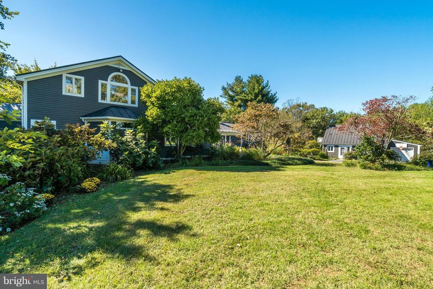 Tree-Lined Drive brings you to very understated, elegant home surrounded by mature gardens, Koi Pond, Stonework & Lovely Grounds on 10.98 Acres!  Farmette Potential! Features Upgraded Kitchen & Baths! Fireplaces! Sunroom w/Brick Floor! Plus Sep Cottage w/2 Car Garage w/office space or Guest Quarters above! Plus another 2 Car Gar w/Workshop Space! Very Unique Property! See Spectacular VirtualTour!