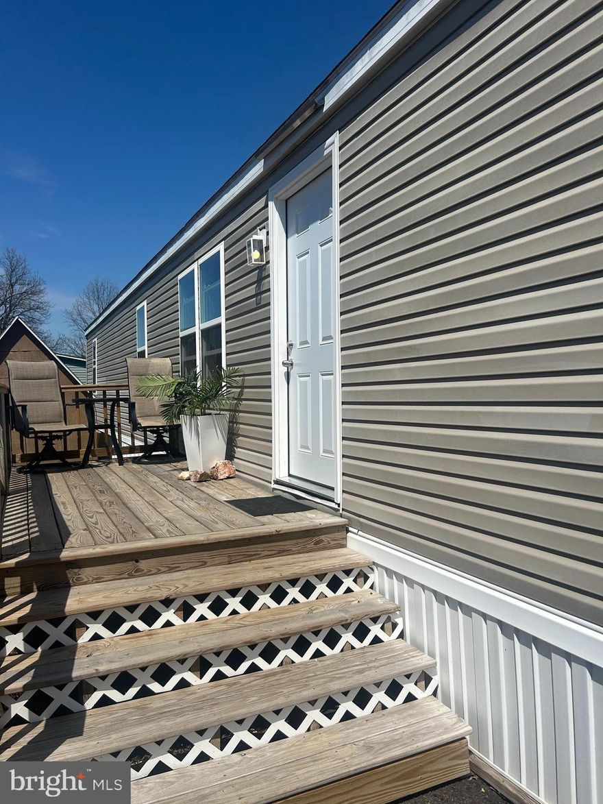 Welcome to this beautifully renovated 2-bedroom, 1-bath manufactured home located in a well-maintained community in Spring City! This move-in ready home offers modern updates and stylish finishes throughout.  Step inside to a bright and open living space featuring new flooring, recessed lighting, and a clean, contemporary design. The fully updated kitchen is a standout, showcasing white cabinetry, sleek countertops, a modern tile backsplash, and stainless steel appliances—perfect for both everyday living and entertaining. The home also includes a convenient in-unit laundry area, updated fixtures, and a fresh, clean look that makes it easy to make your own. Outside, enjoy off-street parking and a low-maintenance exterior. Perfect for a first-time buyer, downsizer, or anyone looking for affordable, low-maintenance living without sacrificing style and comfort. This is an excellent opportunity in a desirable location with easy access to major routes, shopping, and dining. 
Monthly lot rent is $870 and includes water, sewer, and trash. Schedule your showing today!