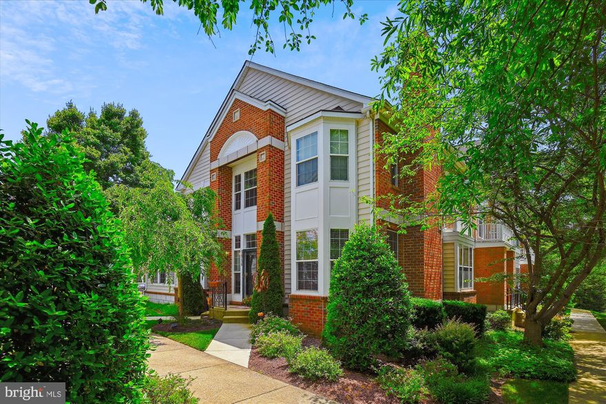 Back on the market after NEW HVAC units and water heater installed (July 2023). New owners can have peace of mind with the new upgrades installed. Come and see this rare end-of-row River Hill townhome situated in one of the most sought-after areas offering the perfect blend of convenience and tranquility.  The current owners are letting go of this beautiful home to pursue a work opportunity overseas.  Expansive windows throughout flood the home with natural light, creating a warm and welcoming atmosphere.  There are hardwood floors throughout the main and upper levels.  Be sure to check out the spacious primary suite which highlights a tray ceiling and includes a walk-in closet and en suite bathroom complete with a soaking tub, double vanity, and walk-in shower.  Crown molding and ceiling fans in most rooms.  There is a 2 car garage and a fully finished lower level with two extra rooms for an office or guests; a full bathroom with a double vanity and a kitchen.  The home is in excellent condition but does include a one-year warranty for extra protection.  The condo association covers the exterior, such as the roof and lawn mowing. Be sure to check out this incredible home and take advantage of this rare opportunity!