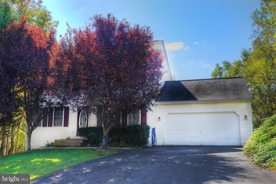 Beautiful colonial in excellent condition, conveniently located for commuting, shopping and the new hospital.  Two expansive decks overlooking wooded area. Well-appointed main level with separate dinning and siting rooms and large living area that opens to the upper deck .  Spacious master bedroom. One mile from new VRE station, 2 miles from Spotsy hospital, shopping schools etc.  See VirtualTour