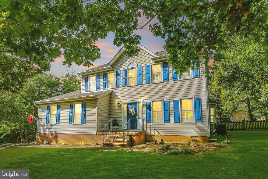 Home should feel like home. A place that should give you a sense of relief as you walk through the door and allow you to breathe after a busy day. 9600 Gunston Hall bridges the gap between tranquil retreat and convenient location. This modern, light-filled home sits on a premium corner lot loving cared for and updated throughout. The location is perfect for commuters. Everything you need is minutes away: minutes to I-95, a short commute to Quantico, a two-minute drive to shopping, restaurants, coffee shops, the gym, and about 10 minutes from all the entertainment Downtown Fredericksburg has to offer. The property has been meticulously maintained and leaves nothing for the new owner to do but turn the key and move in. From the large entry, with cathedral ceilings and grand wood staircase, you see a sitting room to your right that opens into your formal dining room. The eat-in kitchen has room for a kitchen table, making it perfect for a family dinner or for entertaining guests. The kitchen combines with the family room living space creating an open, contemporary feel. The fireplace keeps the openness of the family room feeling homey even with high ceilings throughout the main level. The modern kitchen, with stainless steel appliances and upgraded granite counters, is centrally located and allows the cook in your home to create while still being part of the conversation. The kitchen has plenty of storage and room for stool seating. The bedrooms are spacious and well placed to give those staying in the master privacy. The master has plenty of closet space and easily fits a king bed. The master bath has a soaking tub, a standing glass shower, and separate vanities for easy organization. This home is filled with charming qualities. Notice all of the skylights throughout, the expansive backyard, the low maintenance patio, the 4 seasons room, the beautiful hardwood floors. 
Every room in this home is large and inviting. Curl up by the fire in your open family room. Read a book in the shade on your pressed concrete patio. Enjoy a few moments of quiet in your luxury master bath. Come relax into your new home.