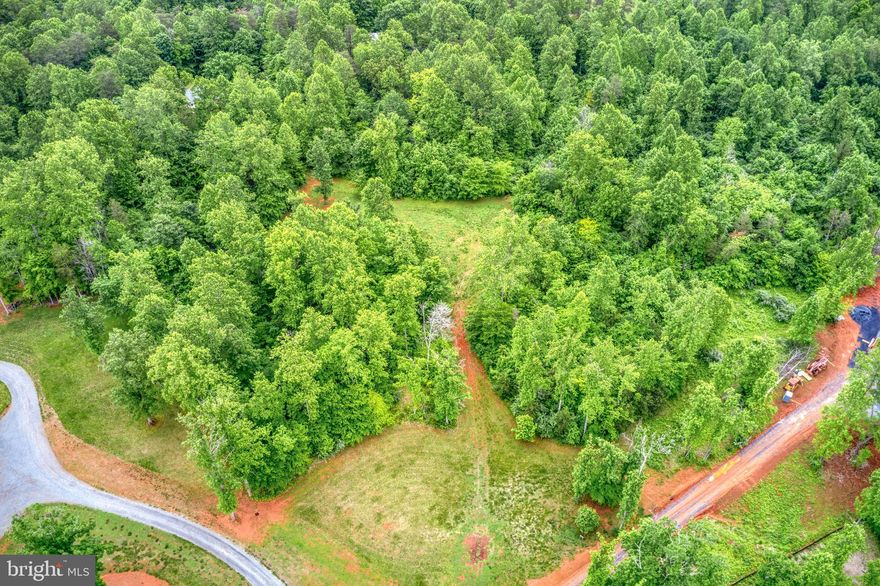 Motivated seller! Build your home on this beautiful 12.26 acre parcel in Ashbourne Farms.  Cleared homesite at the beginning of the lot. The rest of the lot is wooded with 400+ feet of the Muddy Run. Expired 4 bedroom conventional perc site is uploaded in the documents section. Shown by appointment only. HOA is not currently active.