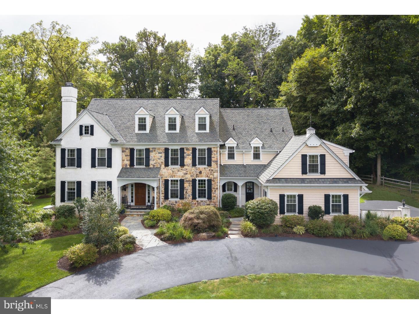 Exquisite and pristine 5-6 Bedroom 5 Full and 2 Half Bath Colonial situated on a 1.04 cul de sac lot in desirable Whitehorse neighborhood and surrounded by the rolling acres of the EA. This stunning home enjoys plenty of amenities coveted by the most discerning buyer, including gleaming hardwood floors, exquisite millwork, gourmet Kitchen, and generous Living, Dining, and Bedroom spaces. Enter this home to a grand Center Hall with formal Living Room with fireplace to the left and formal Dining Room with access to butler's pantry to the right. A bonus room towards the rear left of the main stair is perfect as a study, den, or guest bedroom with adjacent full bath. Enjoy a spectacular and spacious Kitchen with two center islands and high grade appliances including Wolf 6 burner range, Thermador microwave and wall oven, Subzero refrigerator and freezer, Fisher and Paykel dish drawer, and Bosch dishwasher. Ahead of the kitchen sits a cozy family room with coffered ceiling and fireplace, while a sunlit breakfast room sits adjacent and offers beautiful views of the rear yard. A mudroom off of the kitchen provides pantry storage, access to the attached 3 Car garage, and half bath. Ascend the turned stair and through double doors enter the Master Bedroom suite with sitting room, tray ceiling, His and Her walk-in closets, and Master Bath with His and Her sink vanities,steam shower, Kohler jetted tub,and heated flooring. Four additional family or guest bedrooms can be found on the second level, two sharing a jack and Jill bathroom, two with en-suite bathrooms, as well as a laundry room and study area with built in desks. A finished third level offers additional family or storage space. Generous Lower Level is ideal for entertaining or recreation space and provides a half bath, closet perfect for storing wine, and an unfinished portion great for additional storage. Enjoy the tranquil and manicured rear yard from the home's large flagstone patio, with stone steps leading to a a pebbled sitting area, perfect for gathering around a fire pit with friends and family. Luxurious and meticulously cared for, this gorgeous home awaits its next owner.
