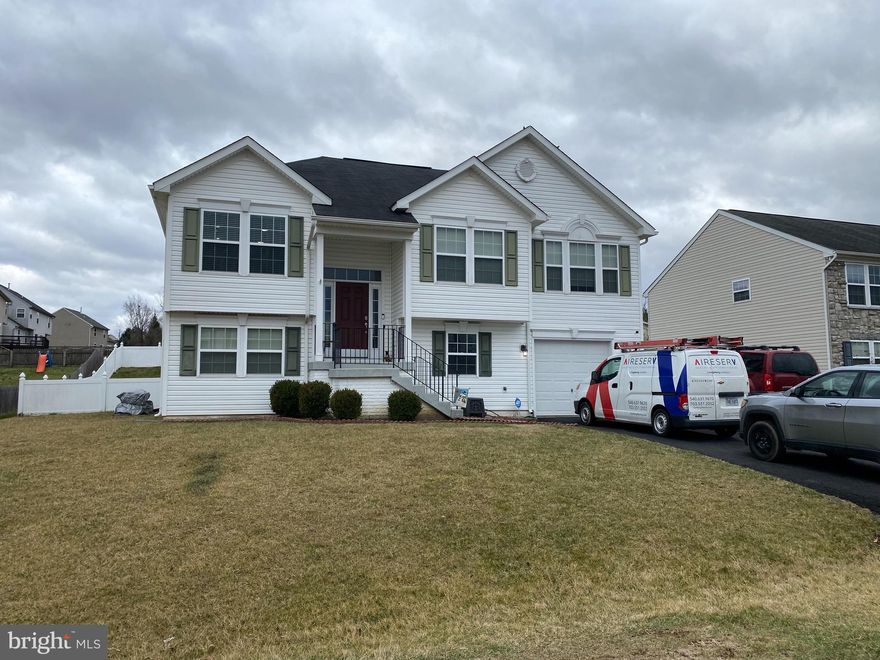 Charming 3 bedroom (possible 4th in basement) 3 bathroom home in Prentiss Point.  Newly stained deck, new patio, new kitchen faucet and single basin stainless sink, freshly painted walls, extended driveway for added parking.  Large rec room in basement with rear access to patio and backyard.  Great commuter location.