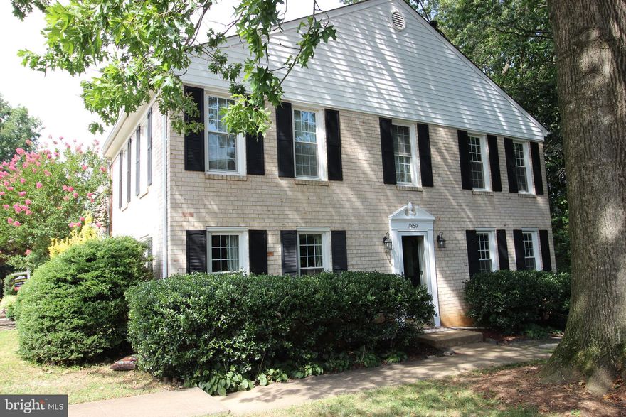 OPEN HOUSE CANCELLED    Elegant and well-maintained end-unit in desirable Deepwood community.  All brick exterior.  Private back yard patio backs to trees.  Four spacious upstairs bedrooms.  Master bedroom with walk-in closet and attached master bathroom.  Gourmet kitchen with cherry cabinets, granite counters, stainless appliances.  Kitchen has large breakfast/sitting area.  Separate formal dining room.  Hardwood on main.  New carpet in basement and bedroom level.  Basement family room would make a fantastic home theater!  Huge basement utility/storage area.  Great parking - assigned parking next to front door, space next to it always seems to be free, and there are always spaces in the lot within a few yards of house.  Additional street parking.  Deepwood has community pool, playground and tennis cts.  Optional Reston Association membership for pools and other amenities.