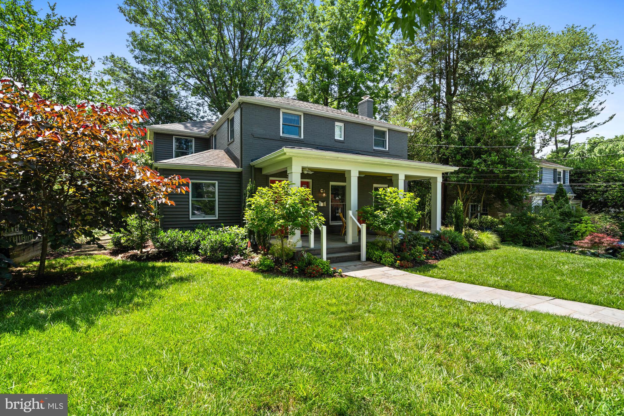Artfully designed and expanded for today's lifestyles... welcome to 5313 Wakefield Road, Bethesda. This professionally updated home in the heart of Green Acres offers the best of indoor-outdoor living -- with whimsical touches, a welcoming front porch, and a garden that’s nothing short of resplendent.
If you have ever strolled down the street, you have likely noticed this home as it is a stand-out in design, color, and thoughtfulness. The wide front porch is approached by floral-lined pathways with a hint of knowing -- as if the home itself whispers, "Yes, I’m as enchanting as you think."
Inside, you’ll find a layout designed for modern and effortless life, beginning with an expanded kitchen at the heart of it all. With easy flow that allows for parties for 50 people as well as intimate dinners for six. Its welcoming foyer, and open sight lines create great flow and balance between the elegant, formal dining room, cozy living room, and bright and expansive great room. An extra large coat closet, powder room, and ample storage completes this level.
The great room is the hub of family life with a seating area surrounded by windows, gas fireplace with a stunning mantle, and built-in bookshelves; table space for casual entertaining and family meals; and a very functional, well equipped kitchen with large island, 36” cooktop, double oven, pantry, and loads of display and storage space (and extra refrigerator in the basement). Extensive counter space allows for group cooking or lets the chef hold court with friends arrayed on barstools around the island.
From here, French doors onto an expansive slate patio sized to accommodate a lounging area and room for a fire pit, a grill, table for eight, wood storage, a console table for serving or plants, and plenty of additional room.Parties for 25 guests easily accommodated, all under the charming cafe lights. Shaded by mature trees.
Every fixture and finish was selected with an eye towards the creation of a warm and elevated lifestyle - textures, colors, tile, fabrics, and natural materials create a harmonious home life.
Upstairs are four bedrooms, an extra large linen closet, and laundry in the hallway. The primary suite is generously sized and has lots of light from windows on three sides (four if you include bathroom windows). The primary bathroom is large and bright, with two separate vanities, and loads of storage. Three additional bedrooms, along with the renovated hall bathroom with separate bath and water closet that facilitates sharing.
The lower level is recently renovated with a large living space that includes a full bath and walk in closet, all designed to accommodate, playroom, extra family room, guest quarters, or work-from-home life.
The lot is enhanced with mature trees and flowering plantings that bloom in a riot of colors. The fenced back yard with patio provides privacy and a sense of retreat, perfect for catching fireflies or dining al fresco.
Updated and immaculately maintained, this 5313 Wakefield Road will have you hooked the moment you arrive.
