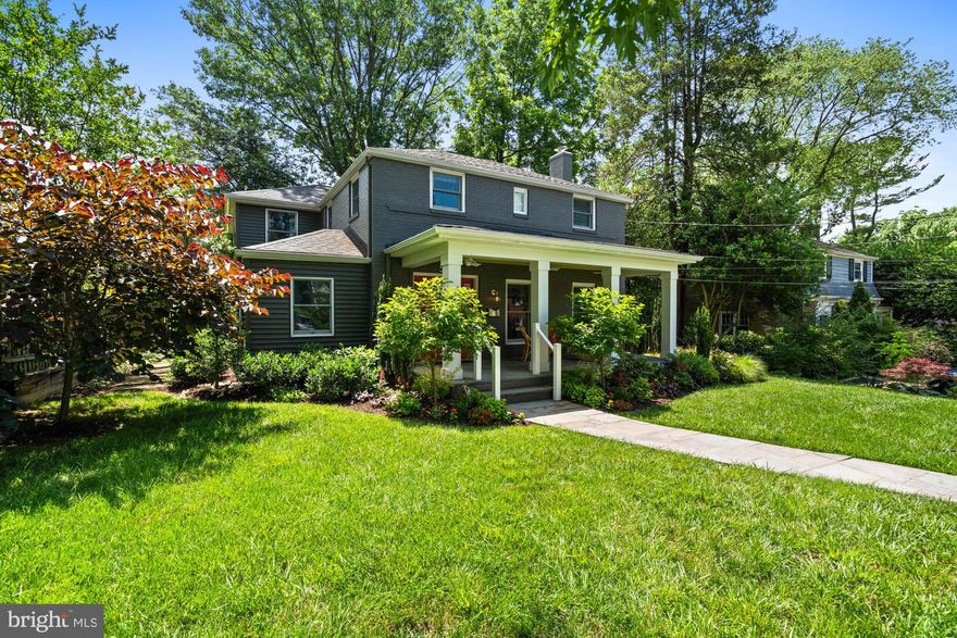 Artfully designed and expanded for today's lifestyles... welcome to 5313 Wakefield Road, Bethesda. This professionally updated home in the heart of Green Acres offers the best of indoor-outdoor living -- with whimsical touches, a welcoming front porch, and a garden that’s nothing short of resplendent.
If you have ever strolled down the street, you have likely noticed this home as it is a stand-out in design, color, and thoughtfulness. The wide front porch is approached by floral-lined pathways with a hint of knowing -- as if the home itself whispers, "Yes, I’m as enchanting as you think."

Inside, you’ll find a layout designed for modern and effortless life, beginning with an expanded kitchen at the heart of it all. With easy flow that allows for parties for 50 people as well as intimate dinners for six. Its welcoming foyer, and open sight lines create great flow and balance between the elegant, formal dining room, cozy living room, and bright and expansive great room. An extra large coat closet, powder room, and ample storage completes this level.

The great room is the hub of family life with a seating area surrounded by windows, gas fireplace with a stunning mantle, and built-in bookshelves; table space for casual entertaining and family meals; and a very functional, well equipped kitchen with large island, 36” cooktop, double oven, pantry, and loads of display and storage space (and extra refrigerator in the basement). Extensive counter space allows for group cooking or lets the chef hold court with friends arrayed on barstools around the island.

From here, French doors onto an expansive slate patio sized to accommodate a lounging area and room for a fire pit, a grill, table for eight, wood storage, a console table for serving or plants, and plenty of additional room.Parties for 25 guests easily accommodated, all under the charming cafe lights. Shaded by mature trees.

Every fixture and finish was selected with an eye towards the creation of a warm and elevated lifestyle - textures, colors, tile, fabrics, and natural materials create a harmonious home life.

Upstairs are four bedrooms, an extra large linen closet, and laundry in the hallway. The primary suite is generously sized and has lots of light from windows on three sides (four if you include bathroom windows). The primary bathroom is large and bright, with two separate vanities, and loads of storage. Three additional bedrooms, along with the renovated hall bathroom with separate bath and water closet that facilitates sharing.

The lower level is recently renovated with a large living space that includes a full bath and walk in closet, all designed to accommodate, playroom, extra family room, guest quarters, or work-from-home life.

The lot is enhanced with mature trees and flowering plantings that bloom in a riot of colors. The fenced back yard with patio provides privacy and a sense of retreat, perfect for catching fireflies or dining al fresco.

Updated and immaculately maintained, this 5313 Wakefield Road will have you hooked the moment you arrive.