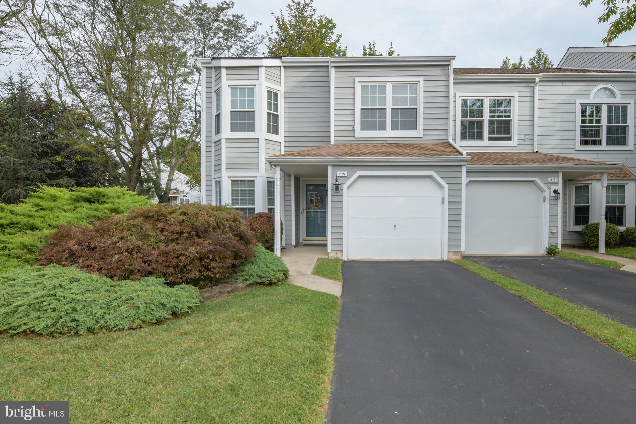Welcome to this sun-drenched end unit townhome in the desirable Windermere community—perfectly positioned to enjoy stunning sunset views and privacy, siding to open space and just steps from Roberts Ridge Park & walking trails to Newtown Borough!
Step inside & find a bright and open floor plan with a remodeled kitchen featuring laminate wood floors, oak cabinetry, Corian countertops, tile backsplash, breakfast room with a bay window. Dining room boasts tray ceiling & flows into a cozy step-down sitting area with a gas fireplace w/ fan & blower, recessed lighting & two large windows. The living room opens to a private fenced yard with brick paver patio—ideal for relaxing or entertaining with great views!
Upstairs, you’ll find three generous bedrooms including a serene main suite with vaulted ceiling, bay window, ceiling fan, walk-in closet, and a remodeled en suite bath. Unwind in the whirlpool tub, with custom-tiled shower and dual-sink vanity. Two additional bedrooms feature double closets & ceiling fans and share a hall bath.
Additional highlights include-One-car garage & driveway, neutral flooring, Convenient second-floor laundry, Community amenities including pool, tennis courts & playground.
Located just minutes from charming Newtown Borough’s quaint shops and dining, with easy access to major routes for commuting to Princeton, Philadelphia, or NYC—this home blends comfort & convenience. Don’t miss your chance to make this inviting home your own!