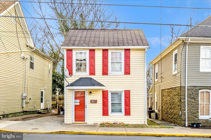 Welcome to 308 South Raleigh Street, a charming and flexible property perfectly positioned in the heart of downtown Martinsburg’s revitalization corridor.
This classic home offers 3 bedrooms and 1.5 baths, plus a flexi room upstairs that can be a hobby room or an office , blending traditional character with everyday livability. Whether you’re searching for a comfortable primary residence or a strategic investment property, this home adapts beautifully to your goals. 
The location is exceptional. Just moments from downtown shops, dining, arts venues, the VA Medical Center, the courthouse, and major commuter routes, this home offers both convenience and long-term value. With continued investment pouring into downtown Martinsburg, buyer and rental demand in this area remain strong.
An outstanding opportunity to own a well-located property with lifestyle appeal and future upside.
Currently tenant-occupied investment property with a lease in place through December 2026. It is an ideal turnkey addition to any investment portfolio. For showings please allow 48 hrs.