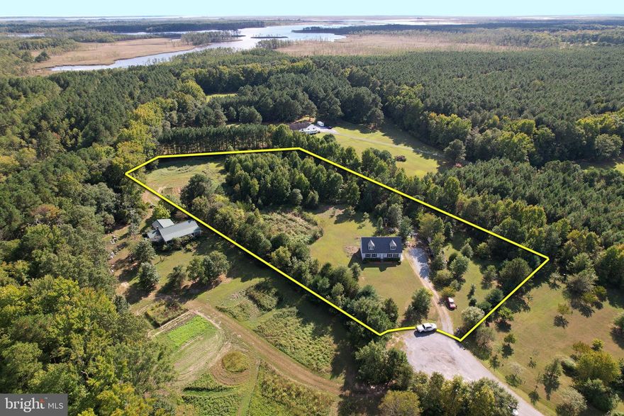 Charming 1.5-Story Home with Spacious Yard in Outdoor Paradise
Nestled at the end of a peaceful cul-de-sac, this 1794 sq ft single-family home offers the perfect blend of comfort and adventure. Built in 2003, the home features some new luxury vinyl flooring throughout, creating a modern and low-maintenance living space. With ample space for outdoor activities, the expansive yard is ideal for families and those who enjoy the outdoors.

Situated on a generous 130680 sq ft lot, this property backs up to public hunting land and is just a short walk from premier fishing spots and boat launch areas. Enjoy quick access to nearly 50,000 acres of public land approximately 50 yards from this property, which includes Fishing Bay Wildlife Management Area, LeCompte WMA, the Lewis Complex, and Blackwater National Wildlife Refuge. Enjoy world-class Sika Deer hunting a stone’s throw from your backyard.

For fishing enthusiasts, a mere 3.6-mile drive brings you to a boat launch where you can reel in blue catfish, snakehead, largemouth bass, and white perch on the scenic Nanticoke River. Whether you enjoy hiking, fishing, hunting, or simply exploring nature, this location is an outdoor lover’s dream.

The home boasts brand-new entry doors, a beautifully landscaped yard, and maintenance-free vinyl siding, offering both curb appeal and convenience. There is ample space for adding a garage, garden, or any other projects you may have in mind. The area is renowned for its low traffic, making it an ideal location for safe bike rides, peaceful walks, and family-friendly living.

If you're also into fine dining and shopping, you're in luck — downtown Cambridge is just 24 minutes from Easton and about 35–40 minutes from St. Michaels. This home offers the best of both worlds: peaceful country living with convenient access to top-rated restaurants, boutiques, and local attractions.

Whether you enjoy hunting, fishing, or boating, this property provides the privacy and outdoor lifestyle you desire. Don’t miss your chance to own this fantastic home in an area known as an outdoorsman’s paradise. It’s an ideal choice for a primary residence or a relaxing second home retreat.