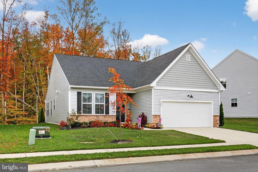 Residents of The Cascades enjoy a true 55+ active adult lifestyle with access to a clubhouse, pool, and beautifully maintained common areas, all set against peaceful open space and conveniently located near Glasgow Park and Christiana Mall. This low-maintenance community offers the perfect blend of convenience, connection, and ease of living. Discover effortless luxury at 663 Mayfield Falls Drive, a modern home that is only 3 years old and thoughtfully designed for comfort and functionality. This beautifully upgraded residence offers 2 bedrooms, 2 full baths, a versatile flex room, and a bright sunroom that fills the home with natural light, creating an ideal setting for everyday living and entertaining. Step inside to find a well-appointed, open-concept kitchen featuring quartz countertops, soft-close cabinetry, a massive pantry homeowners love, and all appliances included for added convenience. Luxury vinyl plank flooring flows through the main living areas into an inviting space anchored by a cozy fireplace. The serene owner’s suite provides a relaxing retreat with a spa-style shower and a spacious walk-in closet. The secondary bedroom is bright and welcoming, offering ample closet space and easy access to the full hall bath. Enjoy outdoor relaxation on the patio, perfect for morning coffee or unwinding at the end of the day. The walk-up attic above the 2-car garage adds exceptional versatility and can be used for organized storage, a quiet home office, a hobby room, or future finished space. Set within The Cascades, this home offers refined, low-maintenance living in a lifestyle-focused community. Schedule your private tour today and experience the ease and comfort this property has to offer.