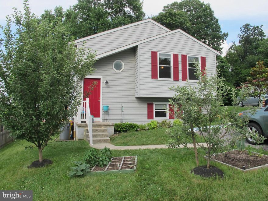 Open floor plan home with fantastic upgrades throughout.  Main living area with bamboo floors, new kitchen peninsula, stainless steel appliances, & wired for surround sound.  Renovated / upgraded bathrooms throughout home.  High efficiency windows & additional insulation ensures low power bills.  Fenced, private yard with paver patio & fire pit.  Sits on a hill overlooking city.  See it today!