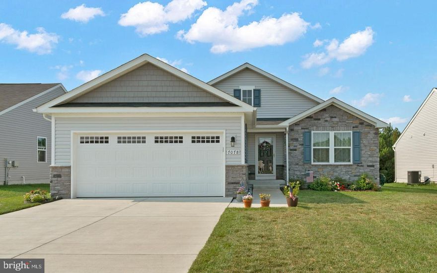 Welcome Home! One level living at its best in sought-after Hopyard Farms! This beautiful rambler has an open and airy floor plan with lots of windows and natural light.  The large family room is just off the kitchen which has stainless steel appliances, granite countertops, and an island that helps provide additional space while cooking or entertaining.  The breakfast area leads you to the perfect sunroom addition and covered back porch where you will spend many days and nights enjoying the weather and the view! There’s also a large dining room that will provide more than enough seating for large gatherings and parties, but it can also be converted to an office or study area if that’s what you need.  The master bedroom has a walk-in closet and a bathroom to impress even the pickiest buyers with tile floors and a shower! There are two other bedrooms on the main floor and a full bathroom.  Hang on, there’s also an unfinished basement, with a full bathroom rough-in, waiting for the new owners to make it their own! Imagine what you could do with all that space! All of this in a wonderful neighborhood with great amenities and just 15 minutes to NSWC Dahlgren and the Maryland Bridge or 20 minutes to Fredericksburg.