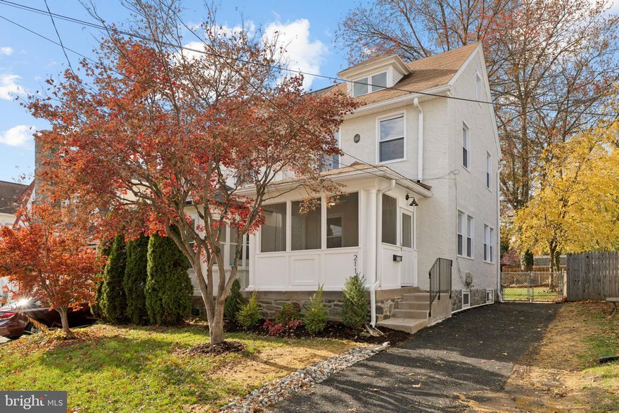 Welcome Home! This fully renovated home perfectly blends timeless charm with modern updates in an unbeatable walkable location. Step inside to discover a bright and inviting enclosed front porch that opens into a stunning open-concept main level. The completely reimagined, designer-quality kitchen is the showstopper—featuring an expanded layout, large center island, premium finishes, and high-end fixtures—ideal for both entertaining and everyday living. Upstairs, you’ll find three spacious bedrooms and a completely updated full bath with modern tile, stylish fixtures, and a clean, contemporary design. The finished basement offers additional living space along with a convenient powder room, perfect for a playroom, office, or guest area. Enjoy the comfort and efficiency of brand-new central air and heating, and relax outdoors in the fully fenced, generously sized yard—great for pets, gardening, or weekend gatherings. Located just steps from coffee shops, restaurants, and local favorites, this home offers the best of vibrant, walkable living with all the modern updates you’ve been waiting for. Come take a look!