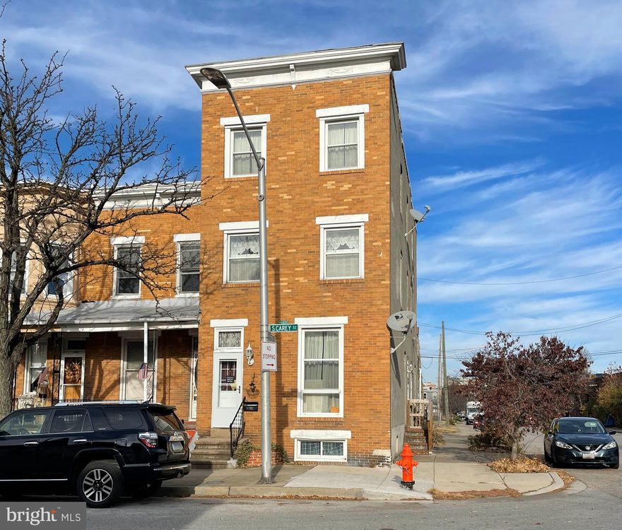 REAL ESTATE AUCTION featuring ON SITE and SIMULCAST ONLINE BIDDING!!! Online Bidding Opens - Monday, January 15, 2024. Live On Site Auction - Wednesday, January 17, 2024 at 11:00 AM. List price is opening bid only. The home is currently arranged for single family use, but had previously been used as three separate units. Rough-ins for kitchens may still be present in upper units.

1421 S. Carey Street is located along the southern edge of Washington Village – Pigtown in South Baltimore, and is within the Pigtown National Historic District. The neighborhood has a rich history, correlated with much of Baltimore’s Industrial past, and still retains proximity to a number of the City’s largest employers. The property is a few blocks from Baltimore’s Stadium Complex and rapidly developing Warner Street Entertainment District. The location is among the most convenient in Baltimore City, with excellent access to I-95, I-395, the Baltimore Washington Parkway (MD-295), Washington Boulevard and a variety of local access roads. In addition to the stadiums, Top Golf, Horseshoe Casino and a handful of event venues, recreational opportunities include the amenities within Carroll Park, which features a golf course, ball fields, walking trails and a playground.