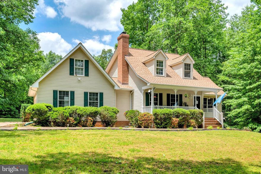 More pics to come soon. 
7.1 beautiful - acres of land in Fredericksburg in the historical battlefield area of Spotsylvania county.  Plat available. Only  5-miles from I-95!  No HOA's.  Paths thru the woods and along the side of a gently rolling stream.  Quiet dead-end street. 3Br, 3ba, space in the basement for one more bedroom. Open floor plan design with wood burning fireplace, breakfast bar, main level master bedroom, partially finished walk-out basement. Family room. With a flue for a woodstove.  Enjoy paths thru woods alongside the stream.  DON'T FORGET TO SEE THE ROOM ABOVE THE GARAGE! 
Just off Rt3, minutes from I-95 and Central Park, the Mall, and Historic Downtown Fredericksburg.