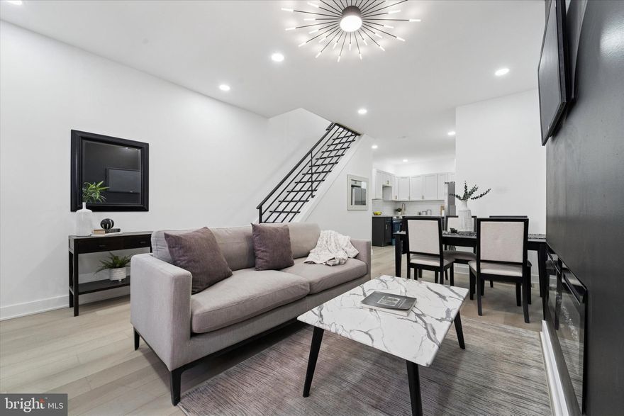 Eligible buyers may qualify for $20K–$30K+ in combined grant and lender assistance, potentially enabling purchase with little to no money required at closing.

Welcome to 537 N Wanamaker Street, a masterfully rebuilt 3-bedroom, 1.5-bath home offering approximately 1,220 square feet of modern, worry-free living. This is a true full-gut renovation where no expense was spared: new high-efficiency HVAC, new plumbing, new electrical, and new energy-efficient windows. The main level offers an open, light-filled layout perfect for modern living. The chef-inspired kitchen features custom cabinetry, stone countertops, and a full stainless steel appliance package, flowing seamlessly into the dining and living areas. A convenient main-floor powder room adds a touch of modern functionality.

Upstairs, you’ll find three bright, well-proportioned bedrooms and a designer full bathroom with contemporary tilework. The lower level provides clean, dry, and usable space—perfect for a home gym, office, or extensive storage.

With all major systems replaced, this home is ideal for FHA and VA financing and offers long-term peace of mind with zero deferred maintenance. Located on a quiet block just steps from Carroll Park, you are minutes away from University City, Center City, and public transit.

If you’re looking for a turnkey home that combines designer finishes with rock-solid fundamentals, this is the one. Schedule your showing today!